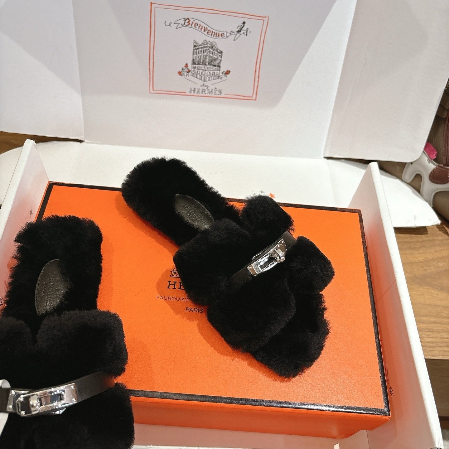 BLACK FAUX FUR MULE SLIPPERS WITH SILVER-TONE ACCENT