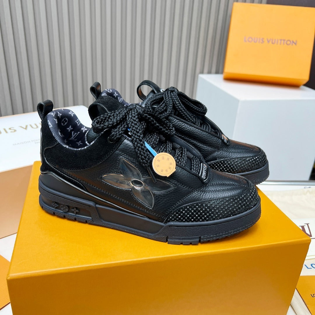 BLACK LEATHER PLATFORM SNEAKERS WITH TRANSLUCENT FLOWER DETAIL