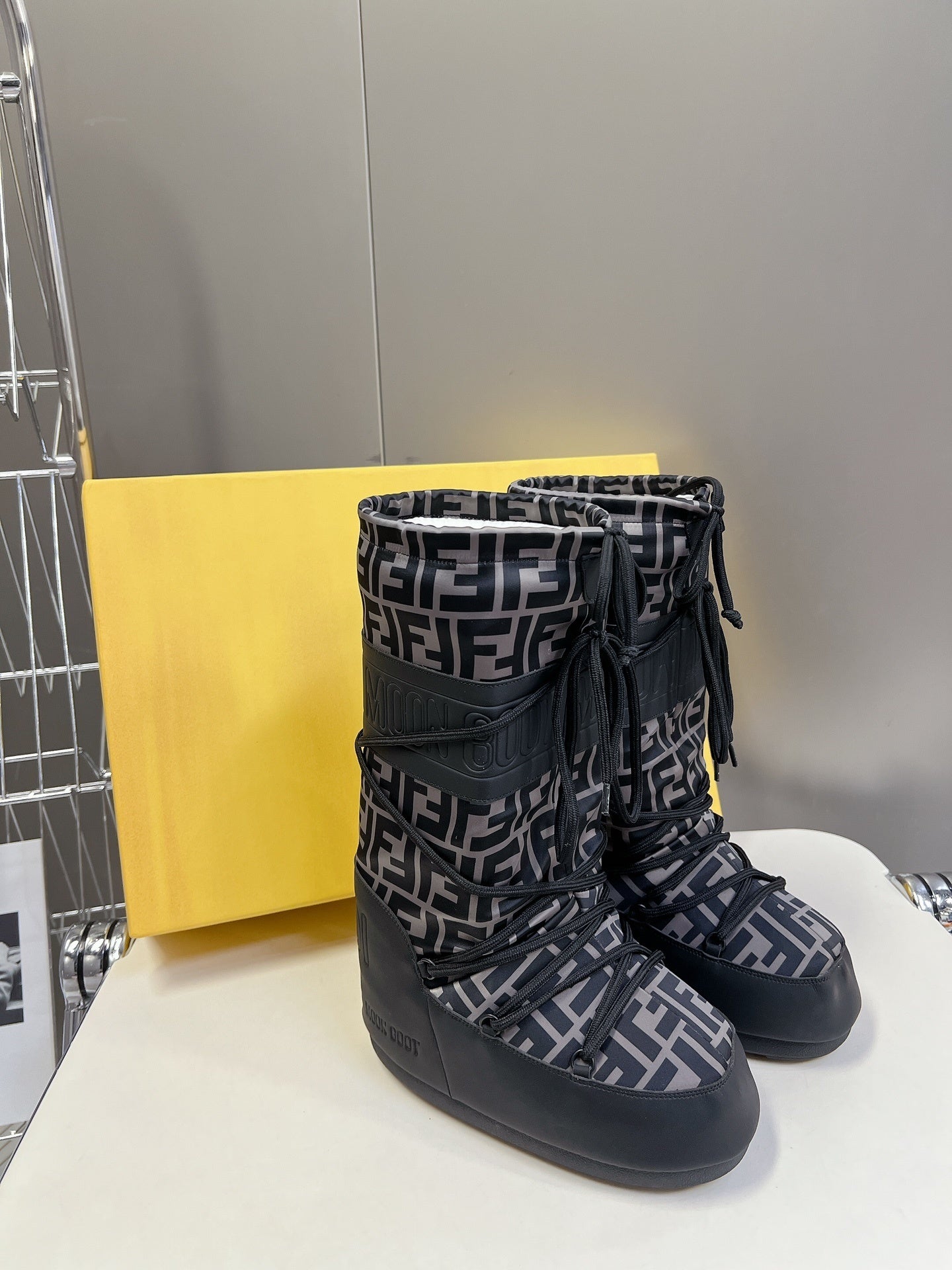 BLACK MONOGRAM-PRINT PADDED WINTER BOOTS