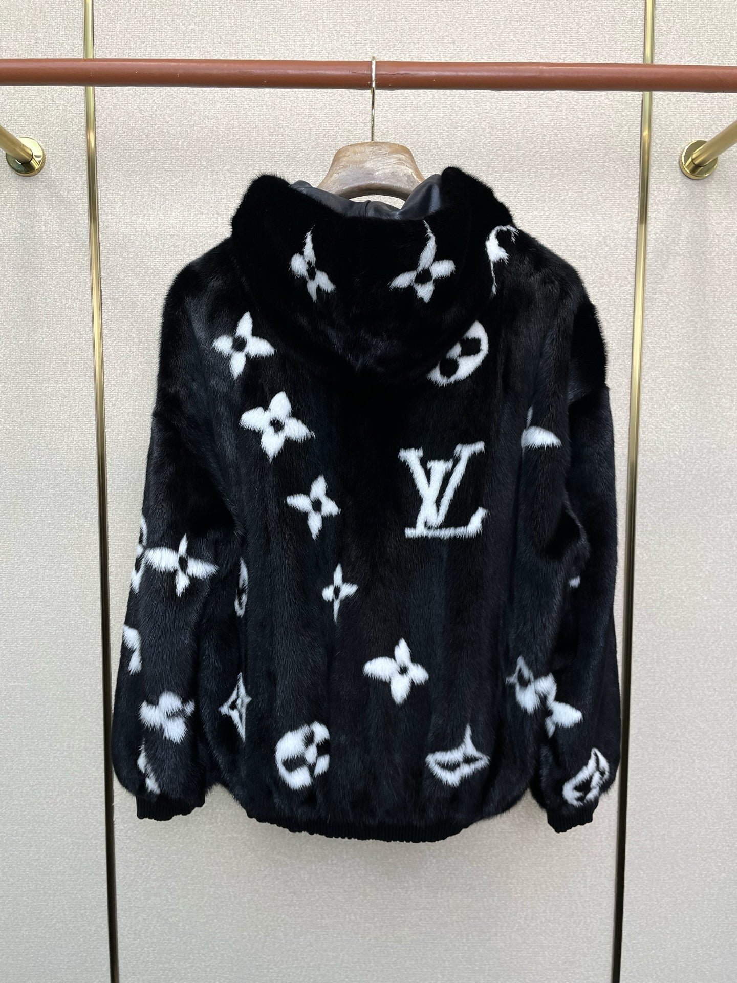 BLACK FAUX FUR HOODED JACKET WITH CONTRAST PATTERN