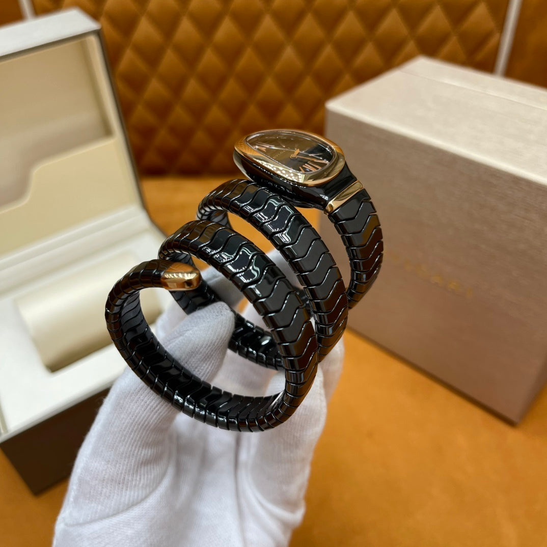 SERPENT WRAP WATCH – BLACK & GOLD ELEGANCE
