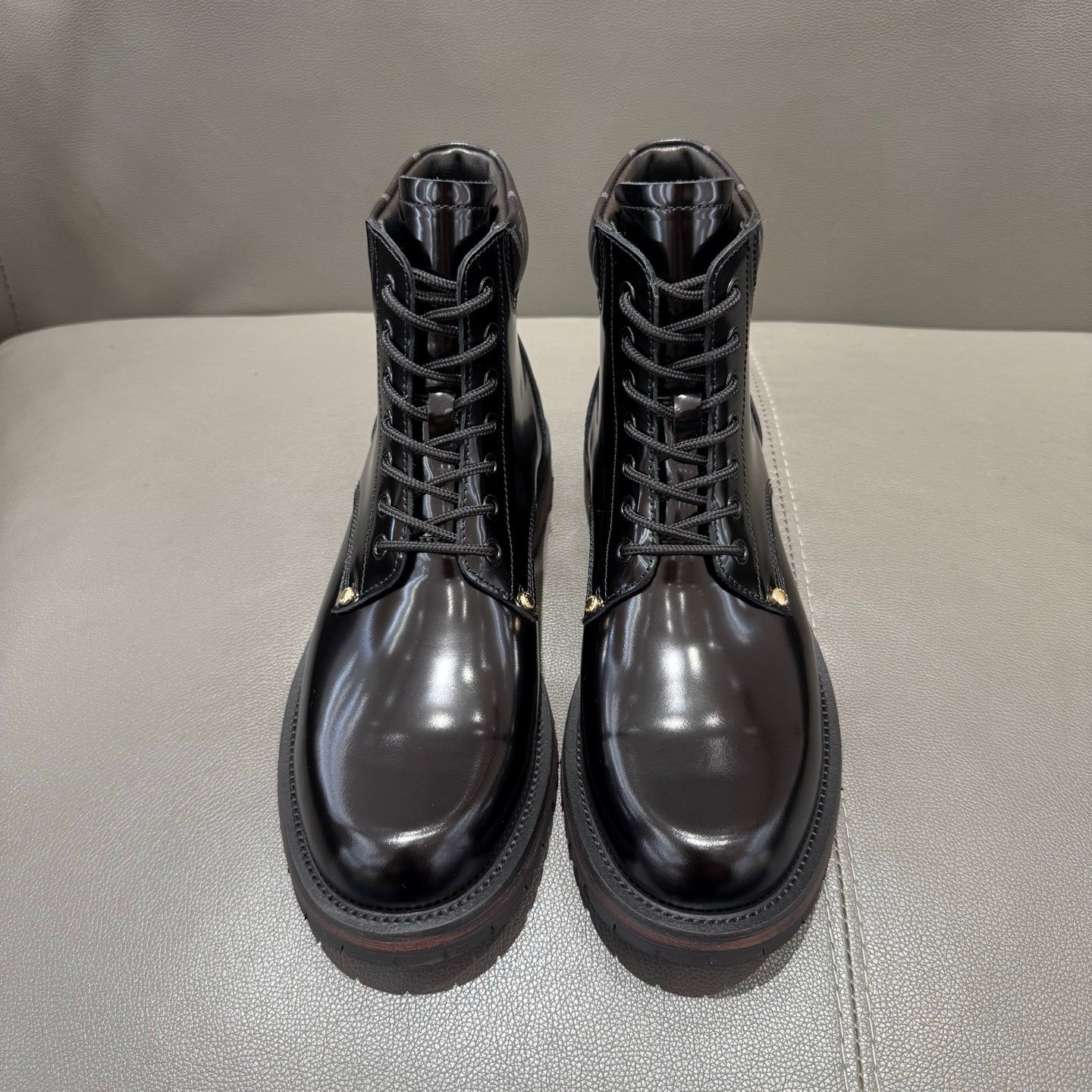 BLACK LEATHER MONOGRAM LACE-UP BOOTS