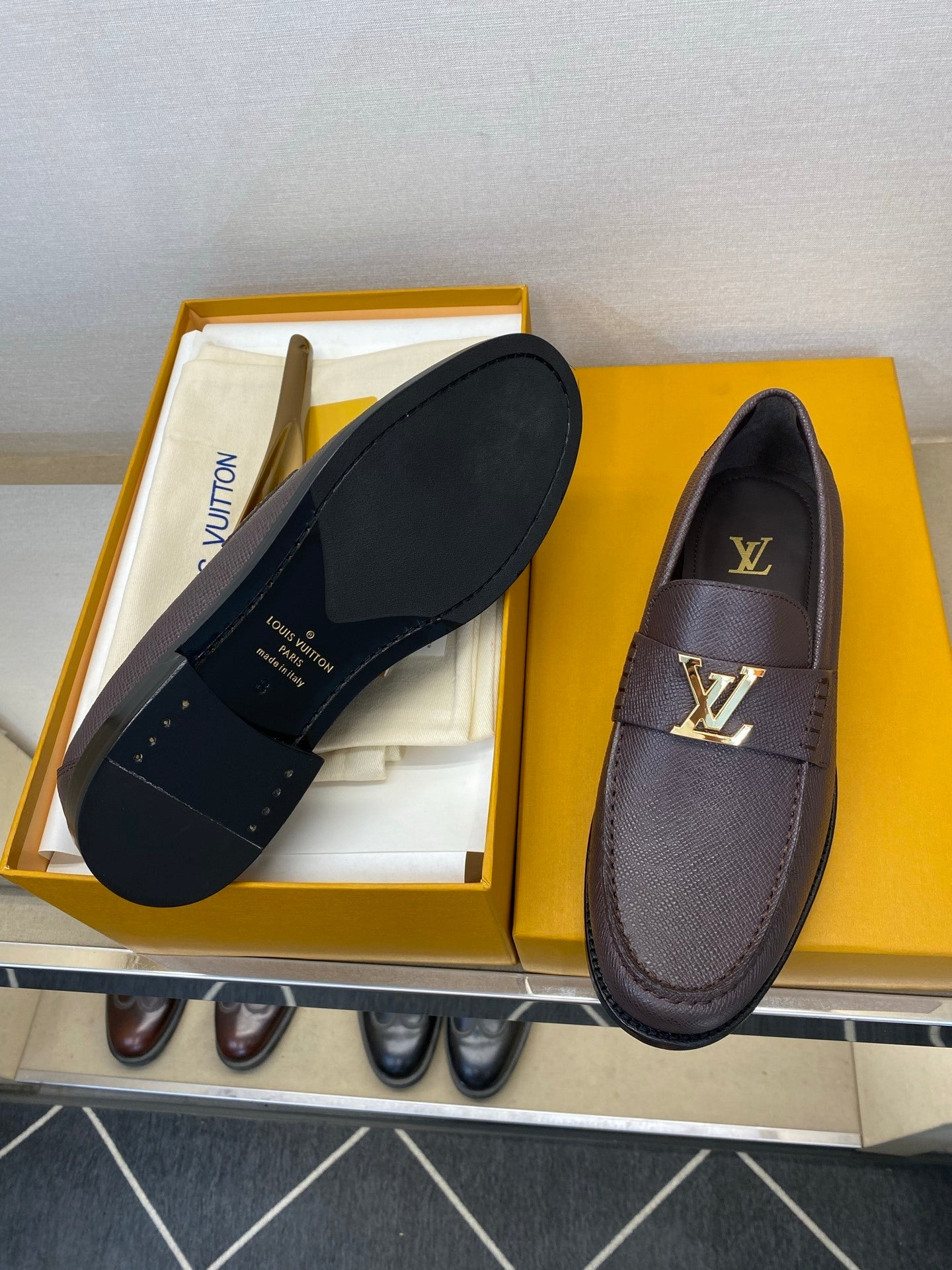 BROWN LEATHER SLIP-ON LOAFERS WITH GOLD-TONE ACCENT