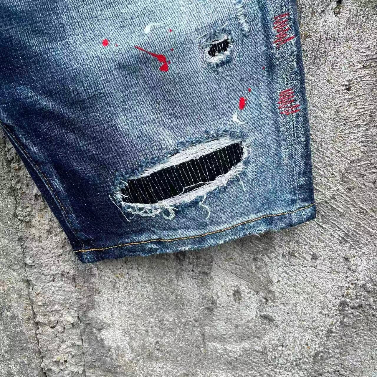 DISTRESSED PATCH DENIM SHORTS