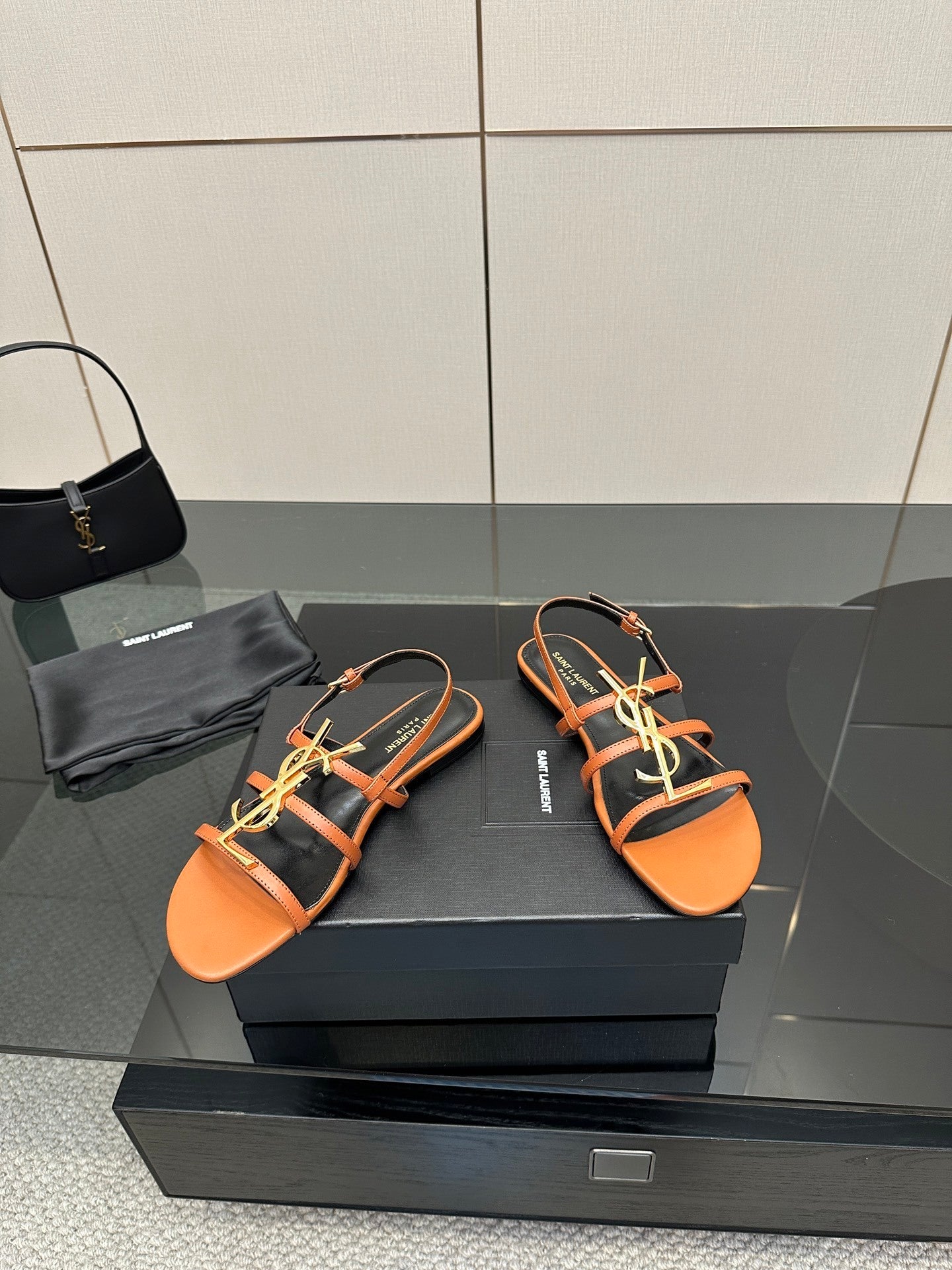 TAN STRAPPY FLAT SANDALS WITH GOLD LOGO DETAIL