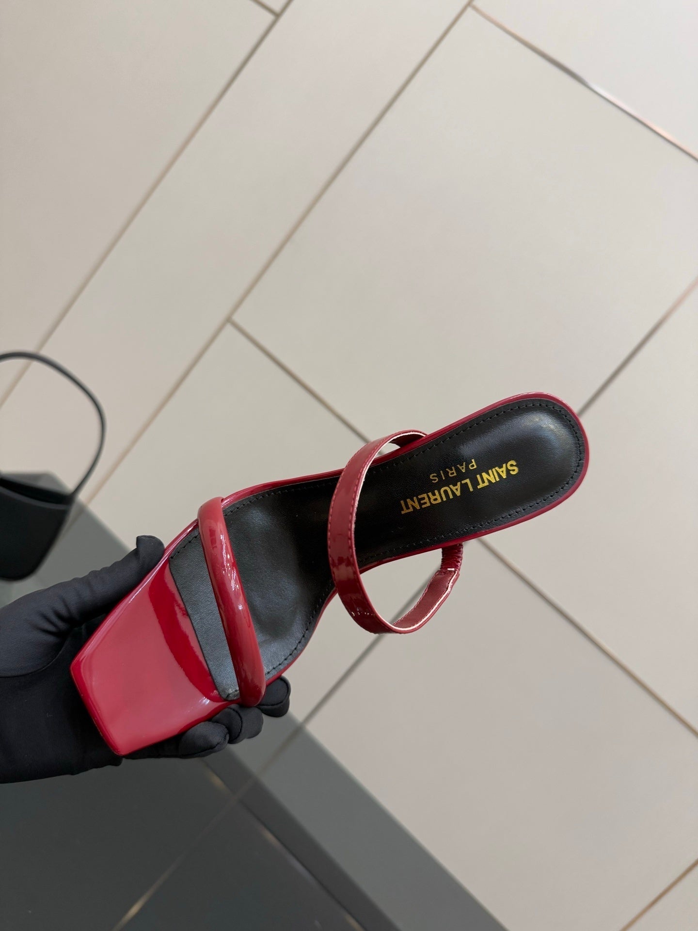 GLOSSY RED STRAPPY HEELS WITH GOLD LOGO HEEL