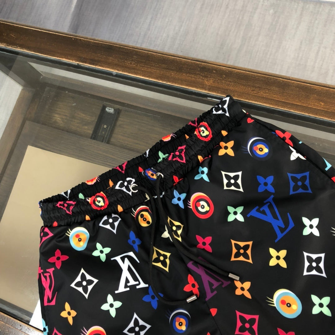 WHITE MULTICOLOR PRINT SWIM SHORTS