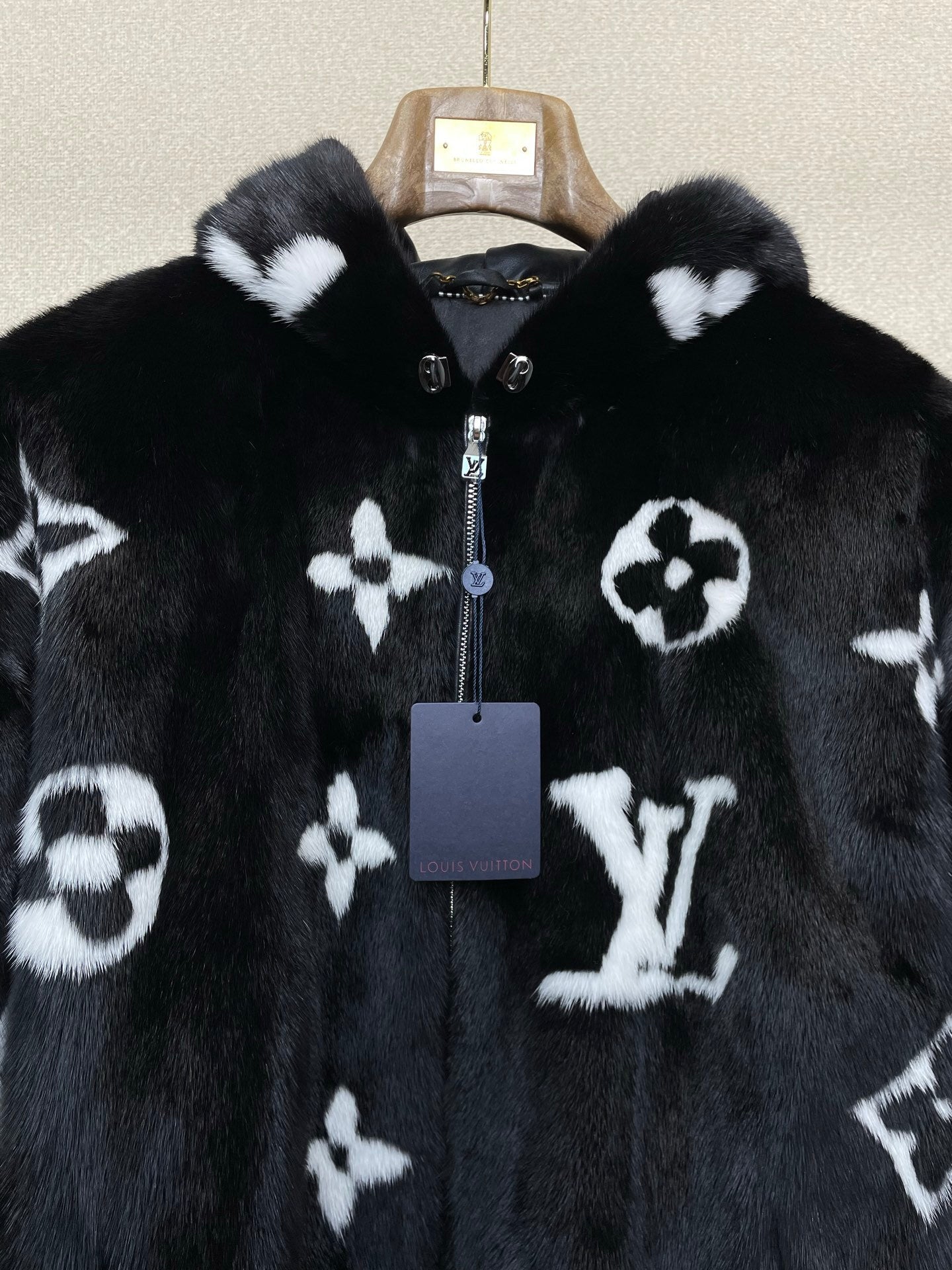 BLACK FAUX FUR HOODED JACKET WITH CONTRAST PATTERN