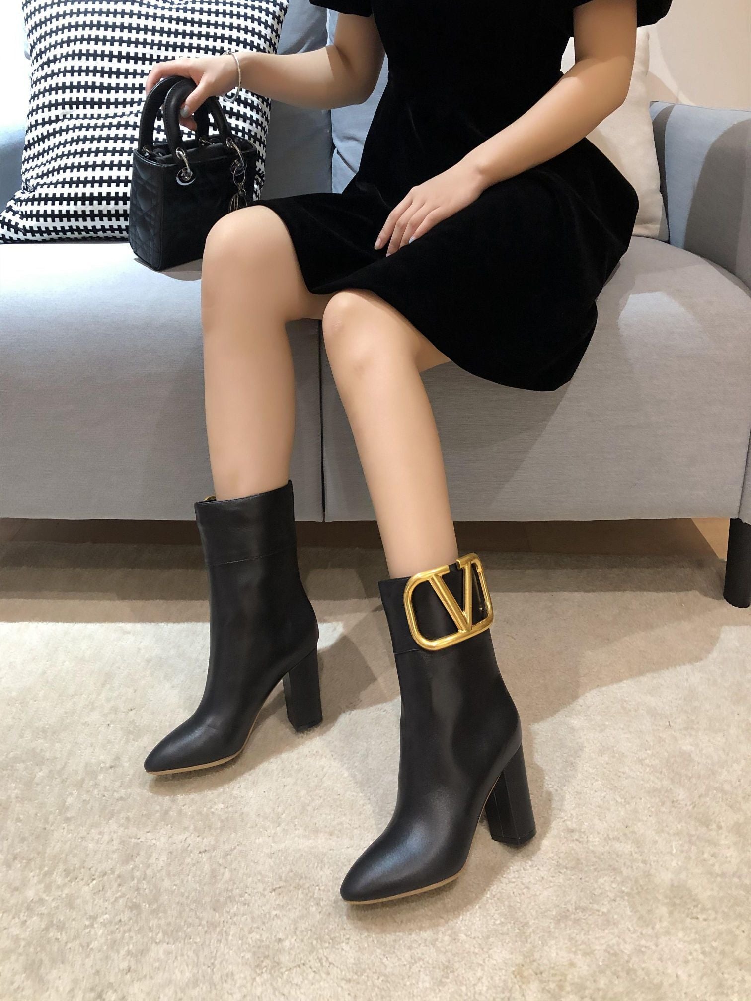ELEGANT ANKLE BOOTS WITH STATEMENT GOLD V DETAIL