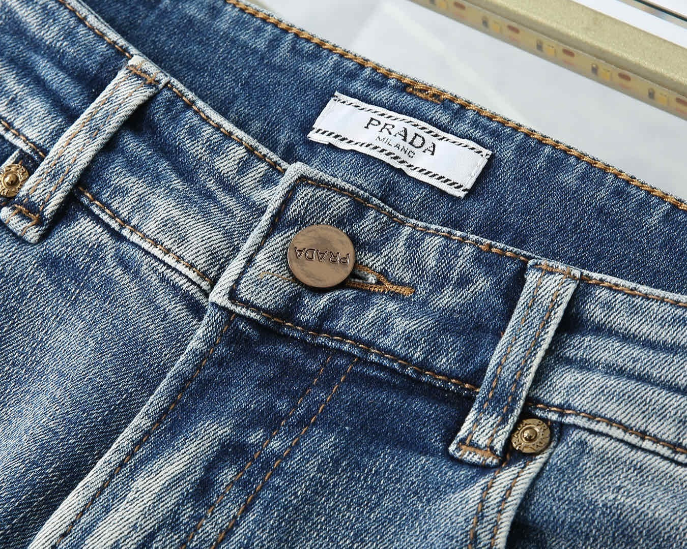 LIGHT WASH EMBROIDERED LOGO DENIM JEANS