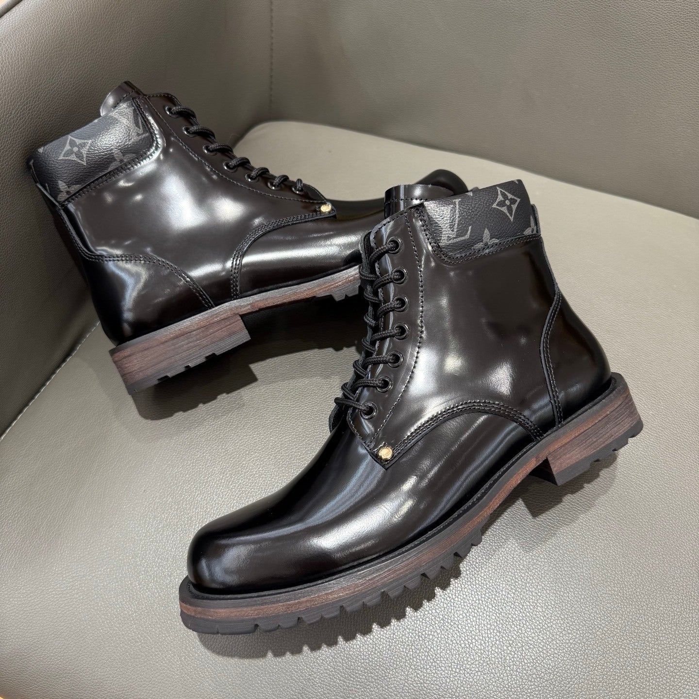 BLACK LEATHER MONOGRAM LACE-UP BOOTS