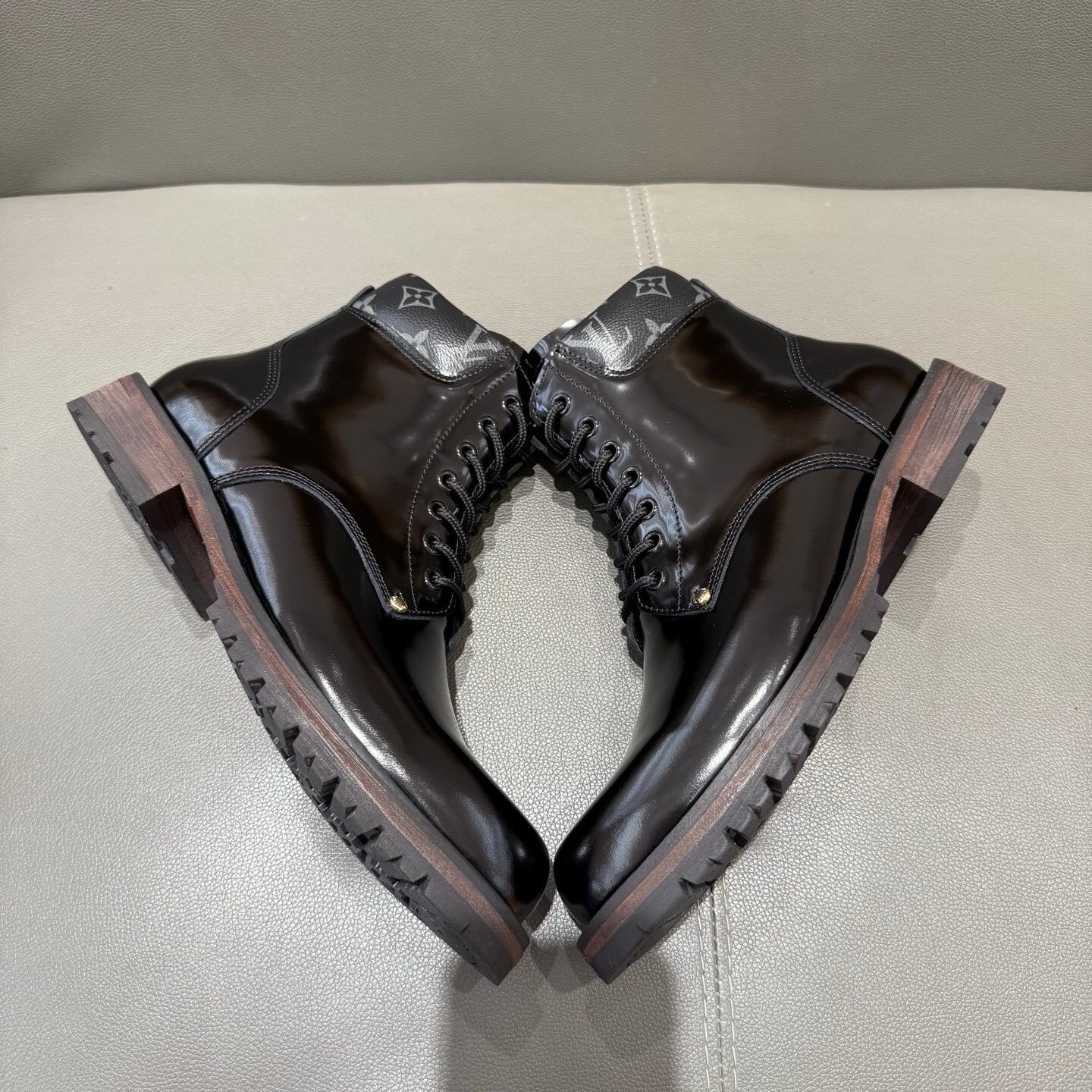 BLACK LEATHER MONOGRAM LACE-UP BOOTS