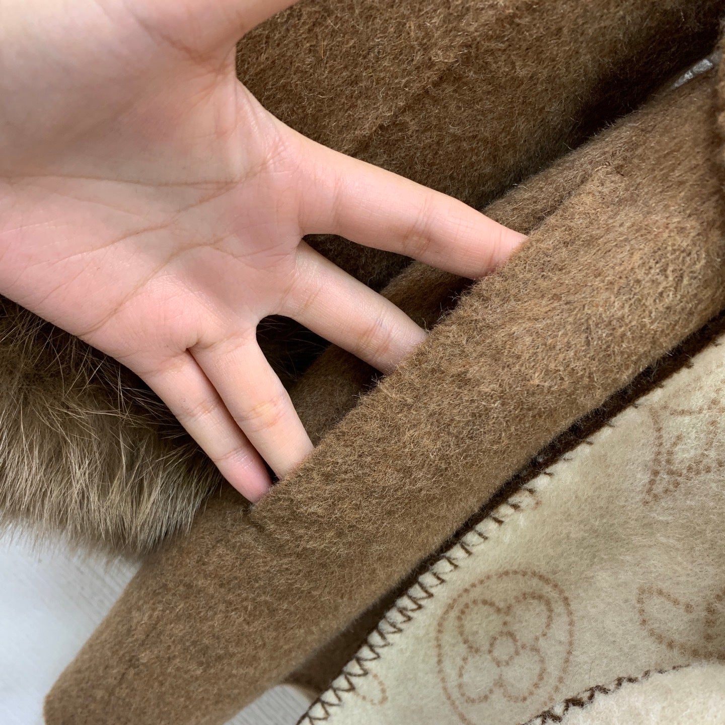 BELTED HOODED COAT WITH FUR-TRIM SLEEVES