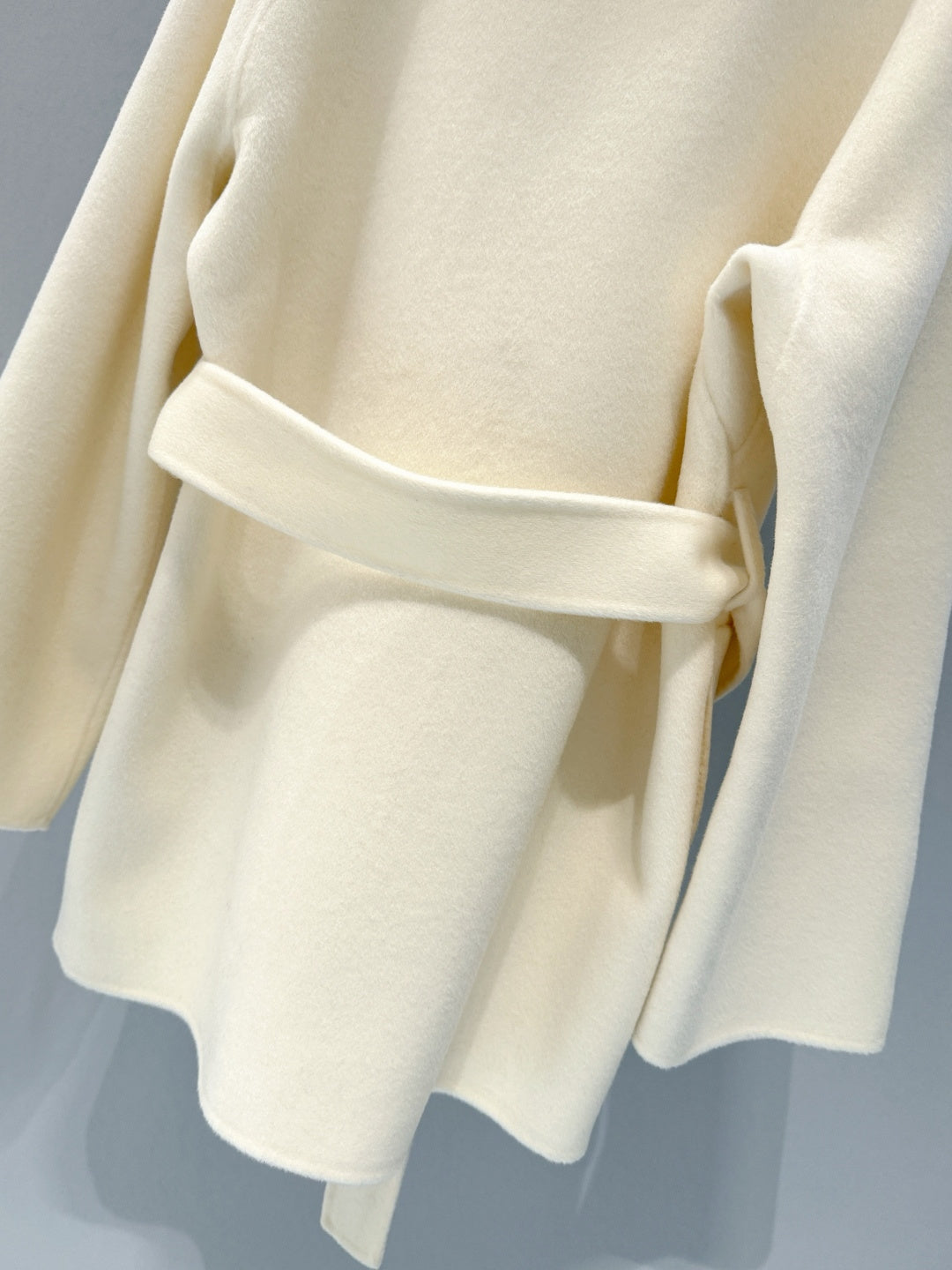 BELTED WOOL BLEND JACKET WITH ASYMMETRIC FRONT DETAIL