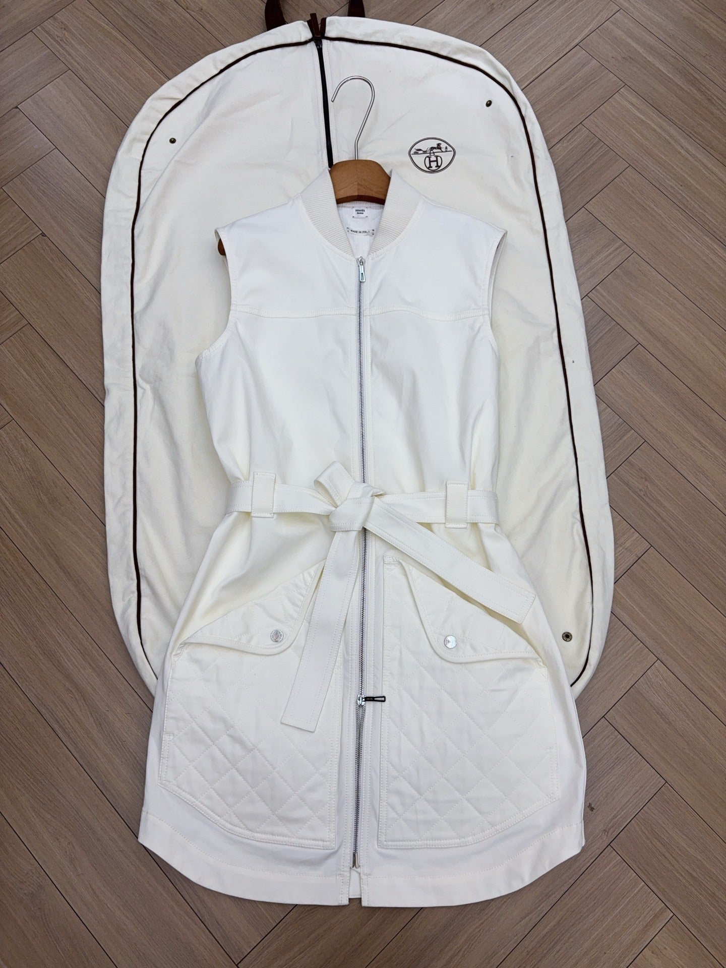 QUILTED ZIP-FRONT SLEEVELESS VEST WITH BELTED DETAIL