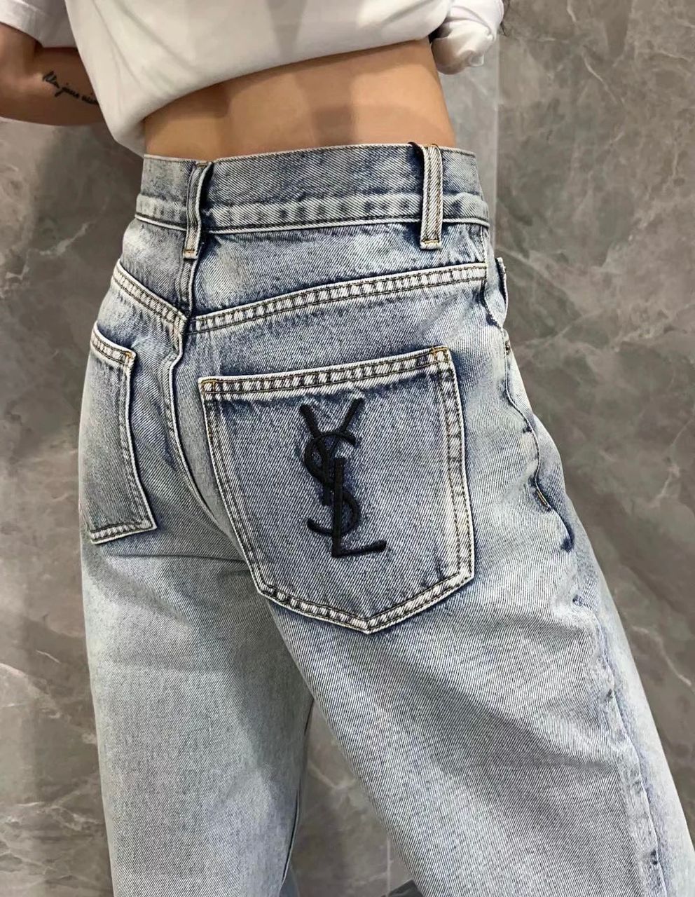 LIGHT WASH DENIM JEANS WITH EMBROIDERED LOGO