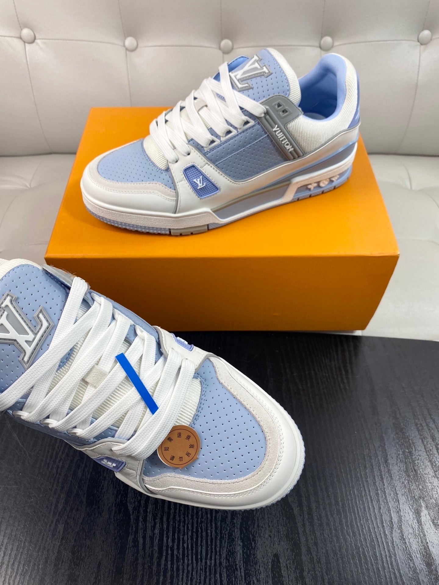 LIGHT BLUE AND WHITE LOW-TOP SNEAKERS WITH PERFORATED PANELS