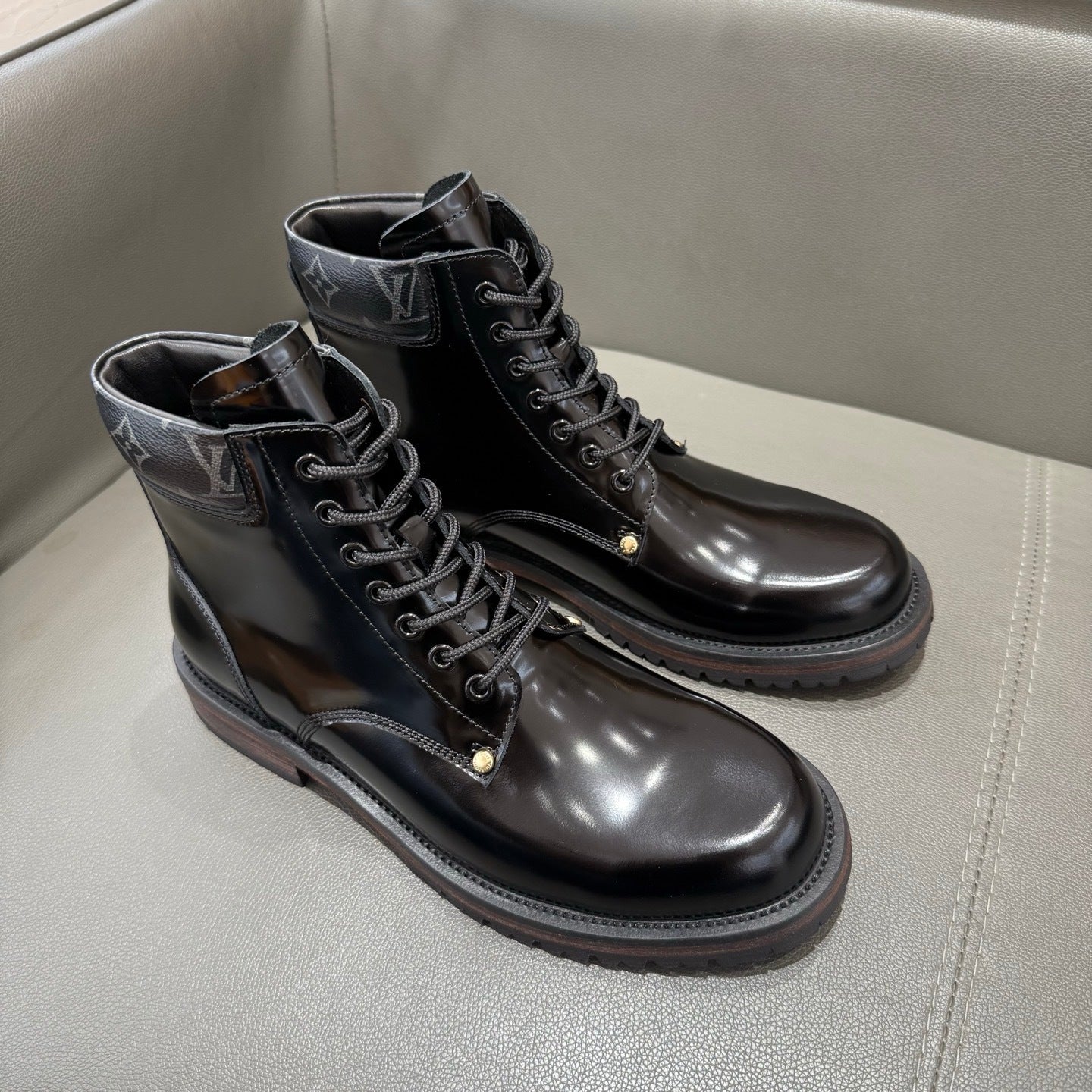 BLACK LEATHER MONOGRAM LACE-UP BOOTS