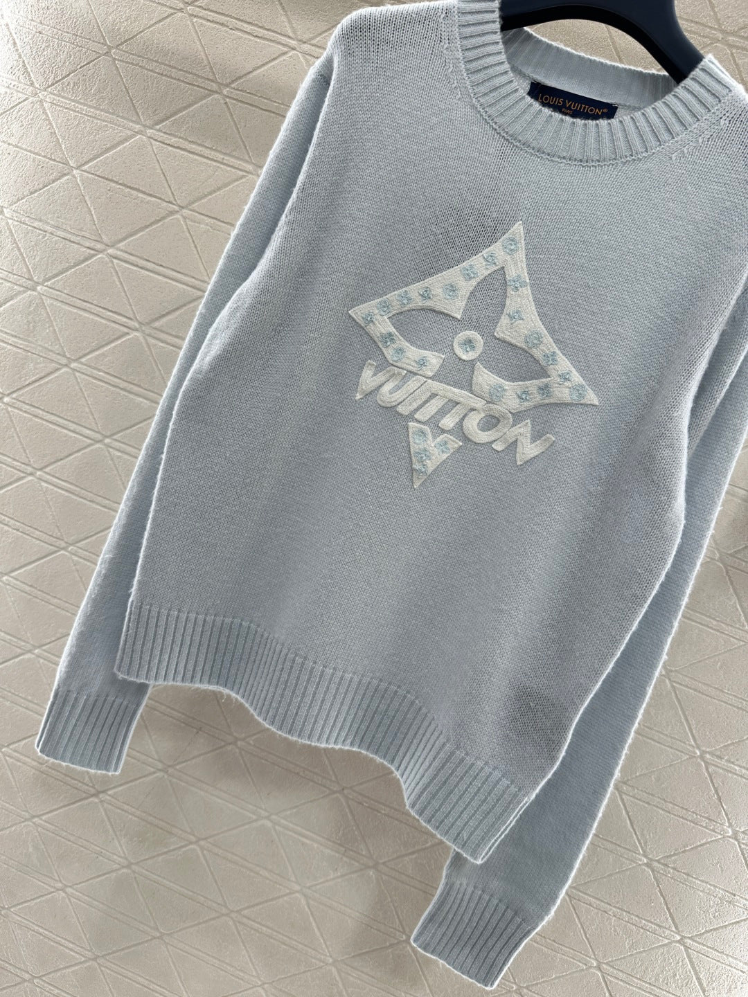 EMBOSSED GRAPHIC CREWNECK KNIT SWEATER