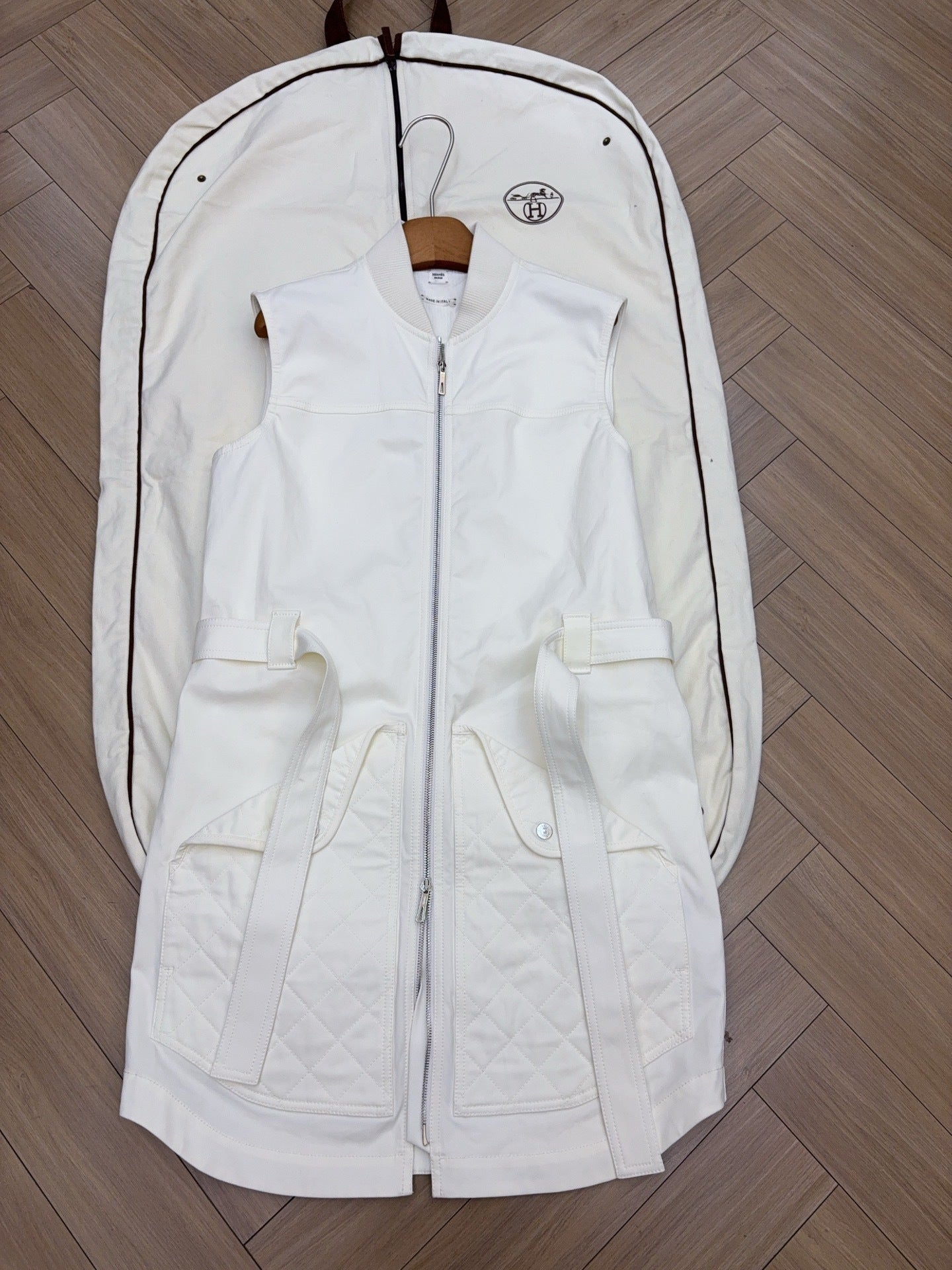 QUILTED ZIP-FRONT SLEEVELESS VEST WITH BELTED DETAIL