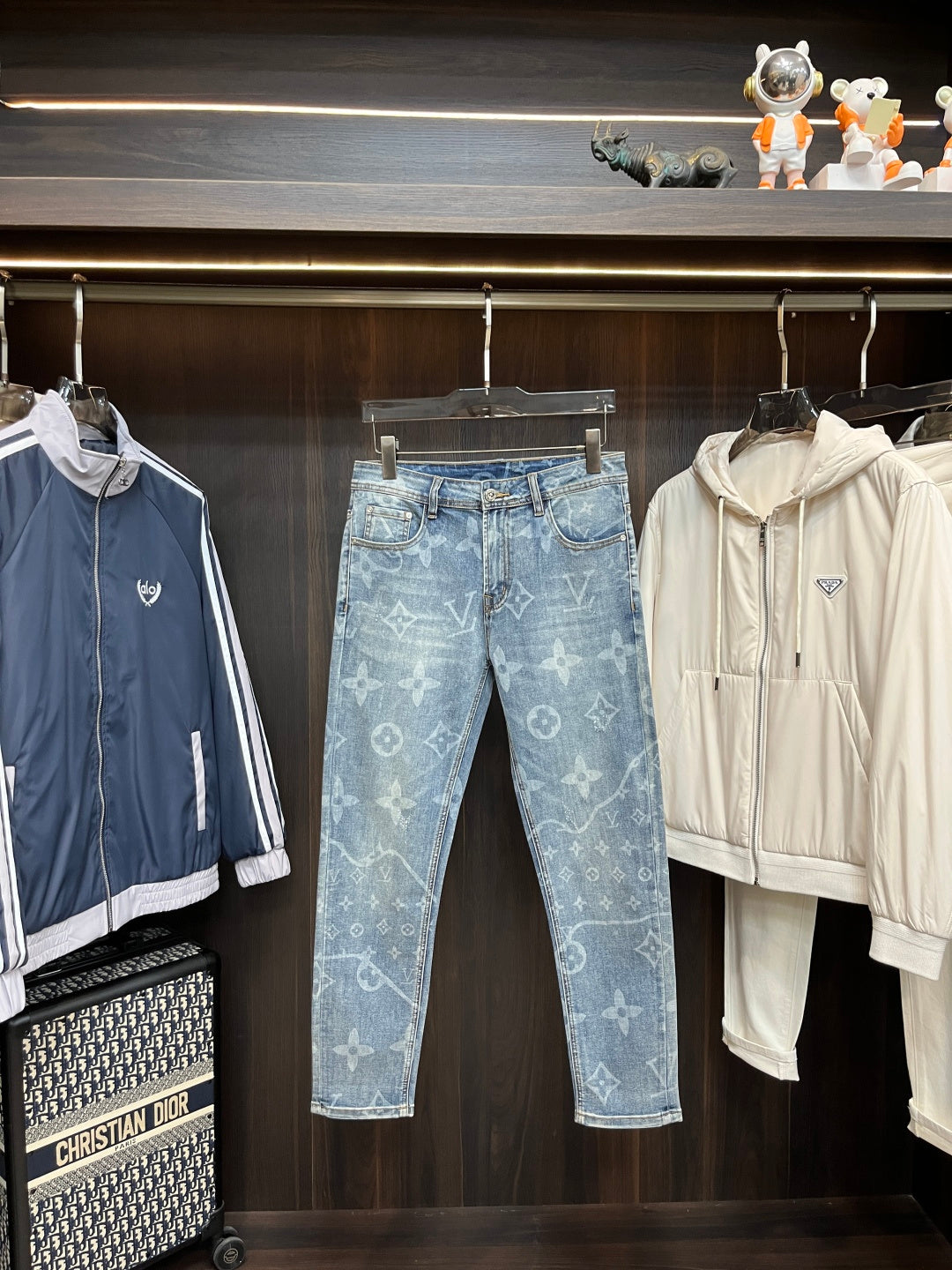 BLUE WASHED DENIM JEANS WITH MONOGRAM PATTERN