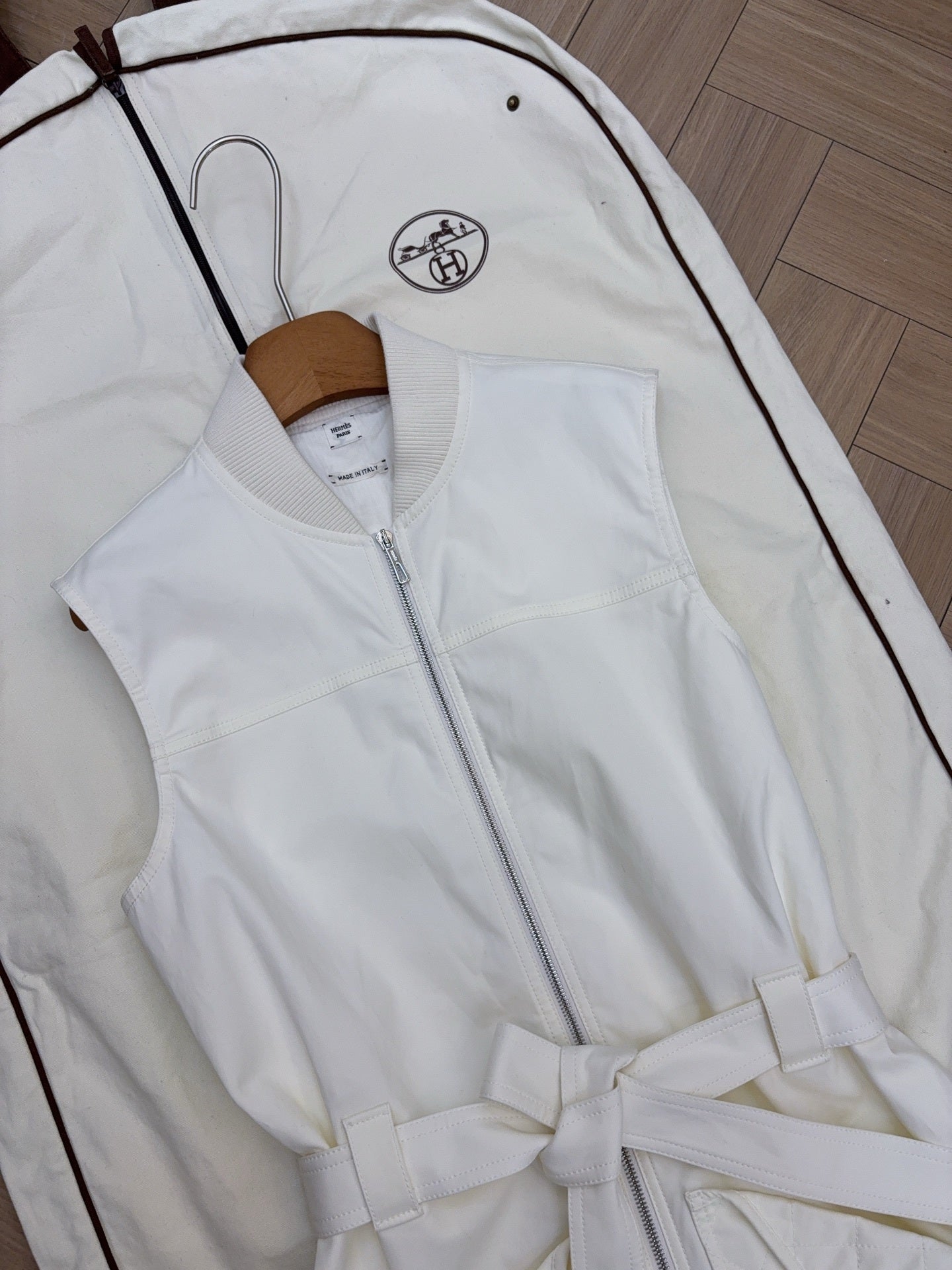 QUILTED ZIP-FRONT SLEEVELESS VEST WITH BELTED DETAIL