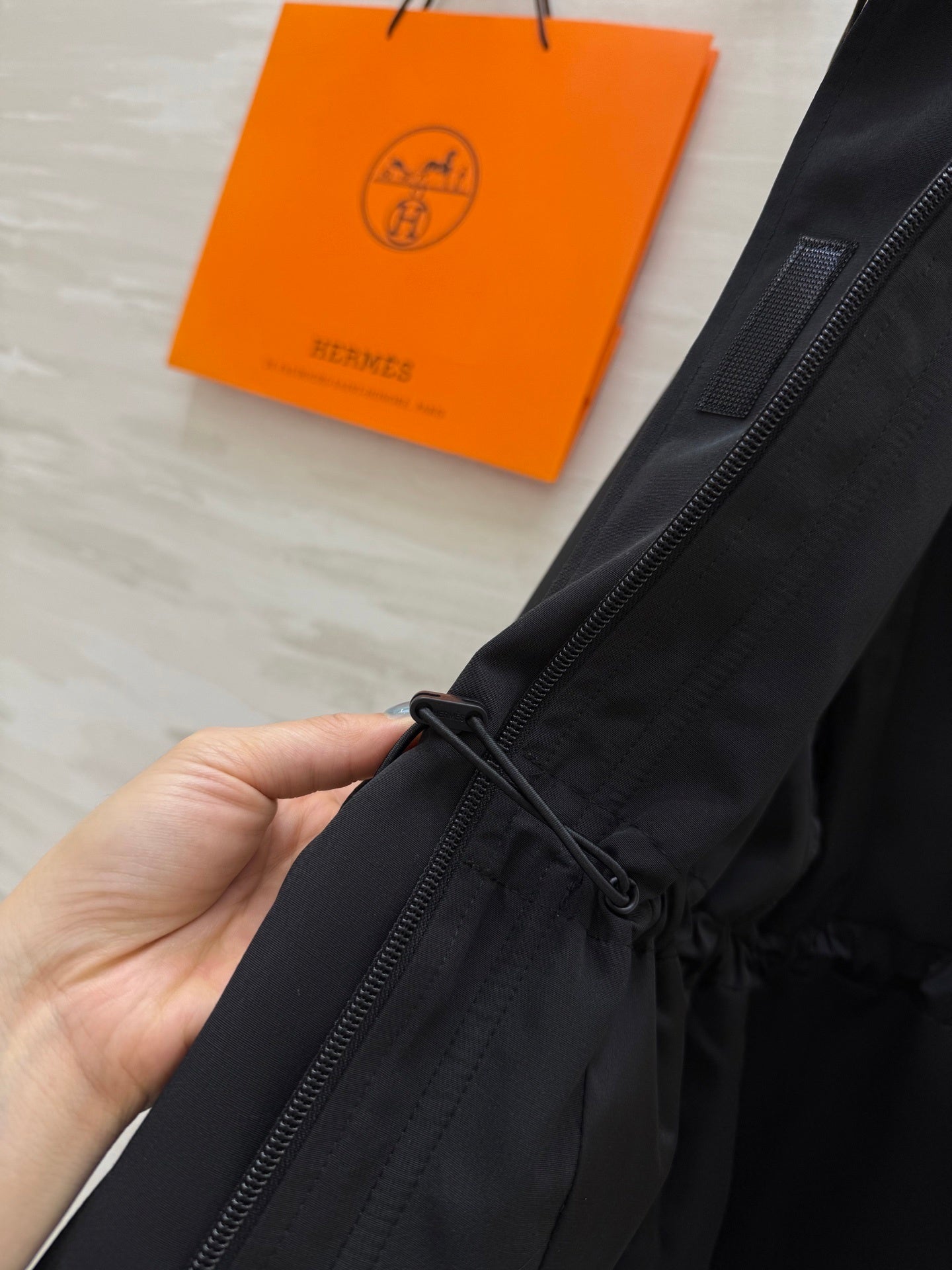 UTILITY HOODED JACKET WITH ADJUSTABLE WAIST