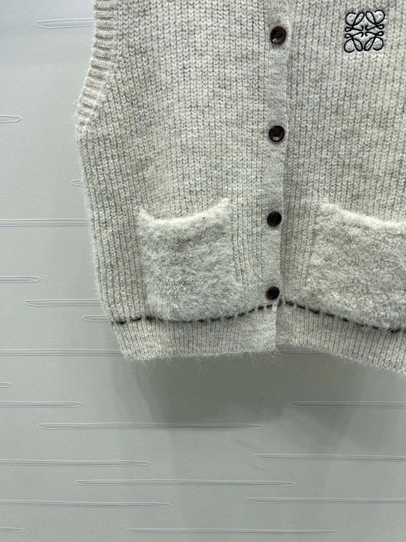 BUTTON FRONT KNIT VEST