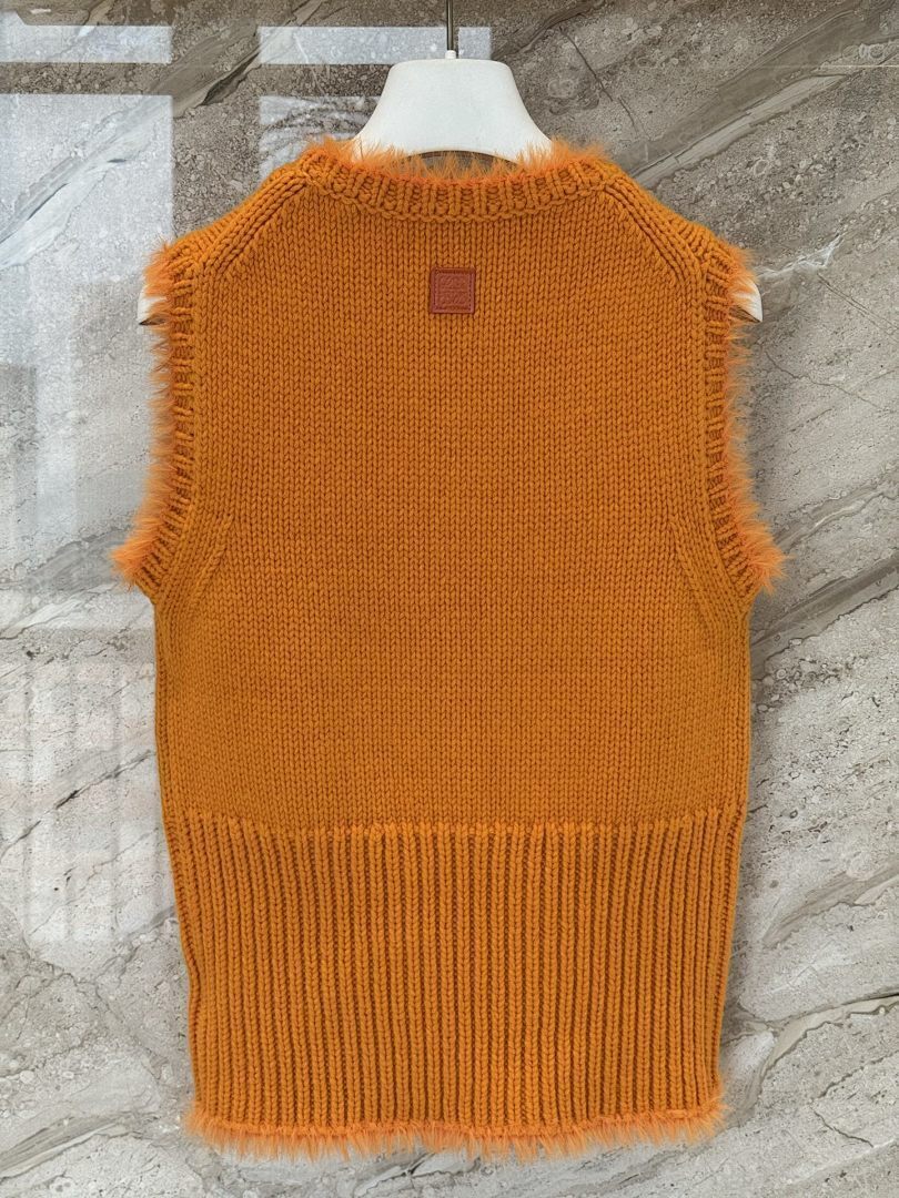 TEXTURED KNIT SLEEVELESS SWEATER