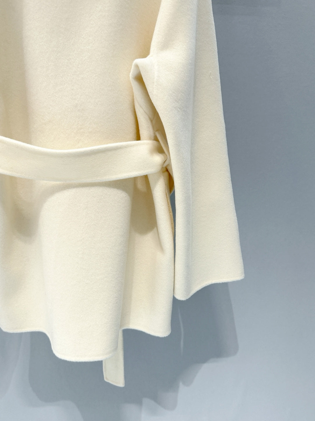 BELTED WOOL BLEND JACKET WITH ASYMMETRIC FRONT DETAIL