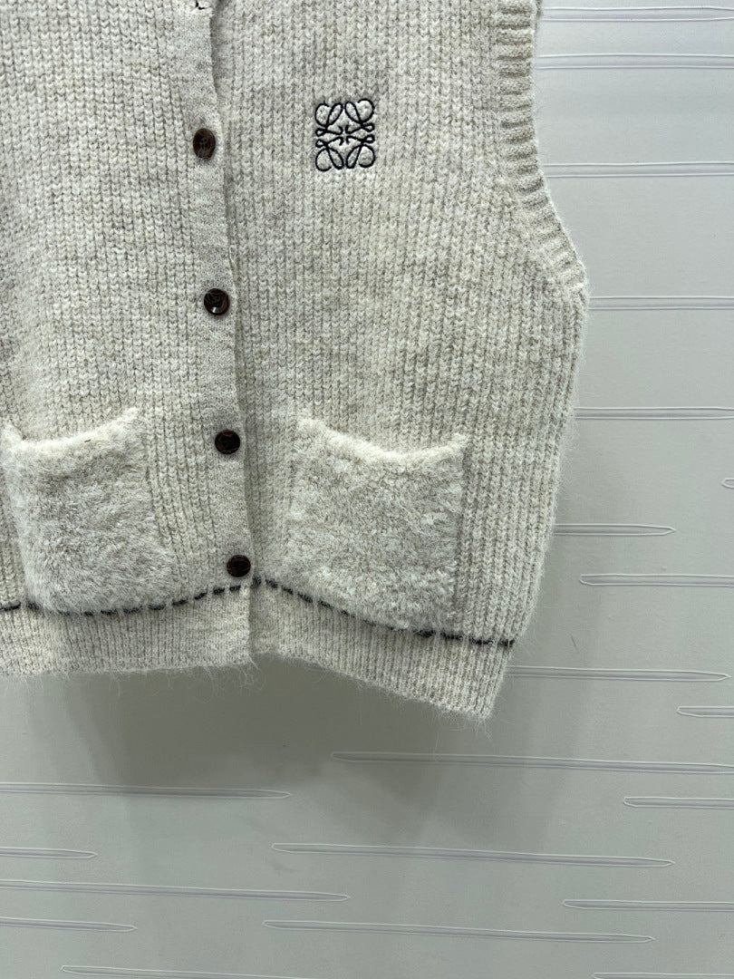 BUTTON FRONT KNIT VEST