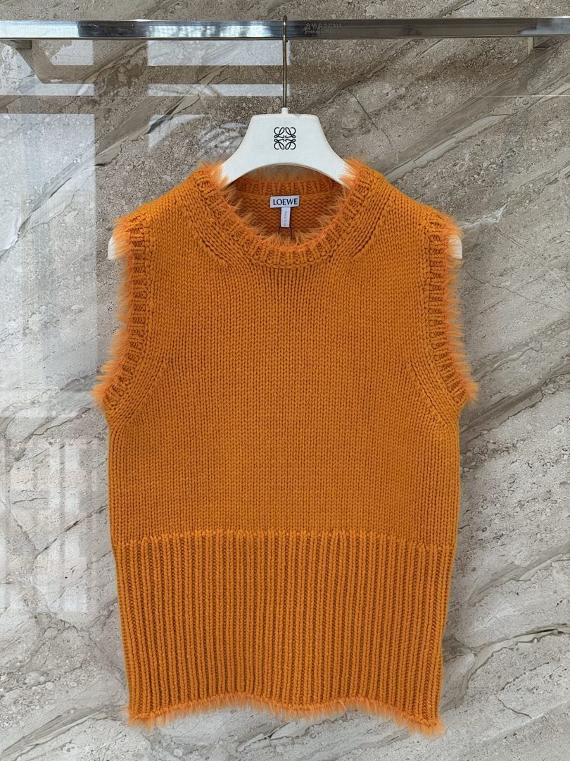 TEXTURED KNIT SLEEVELESS SWEATER