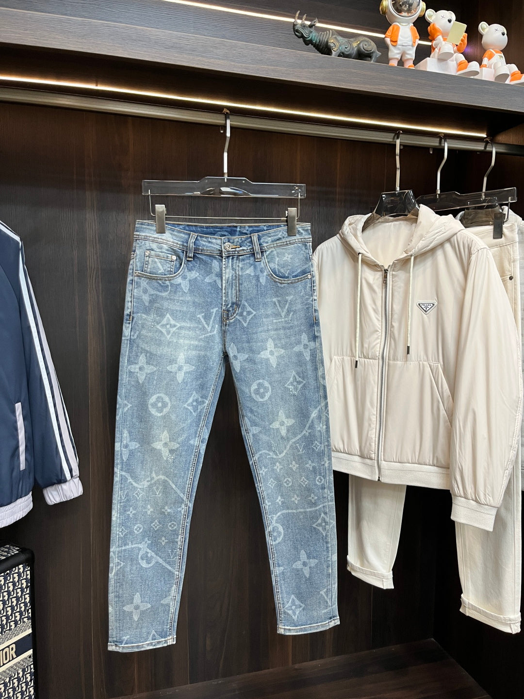 BLUE WASHED DENIM JEANS WITH MONOGRAM PATTERN