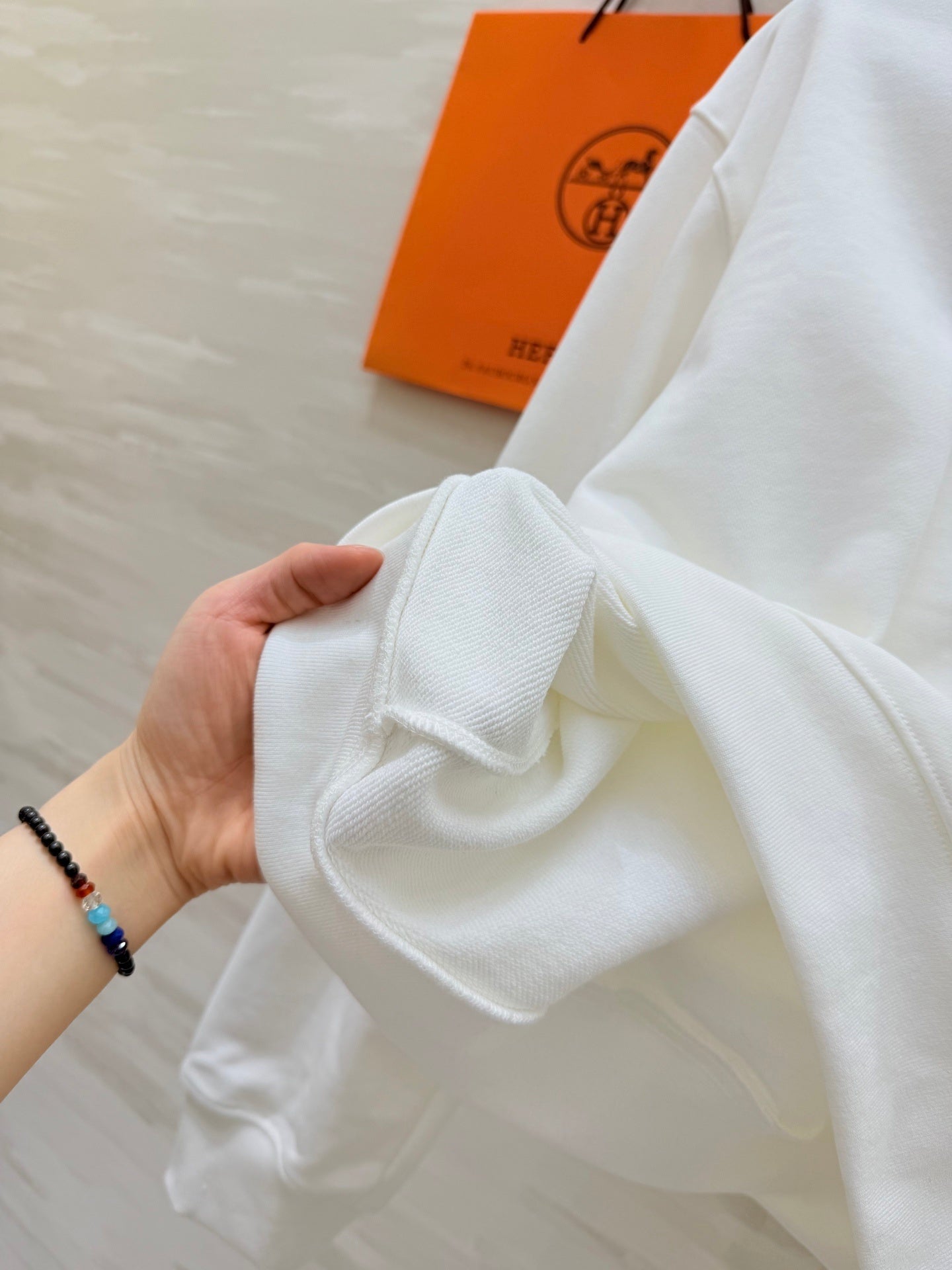 IVORY HOODED SWEATSHIRT AND WIDE-LEG LOUNGE PANTS SET