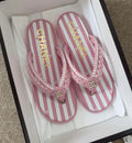 PINK STRIPED BRAIDED THONG SANDALS