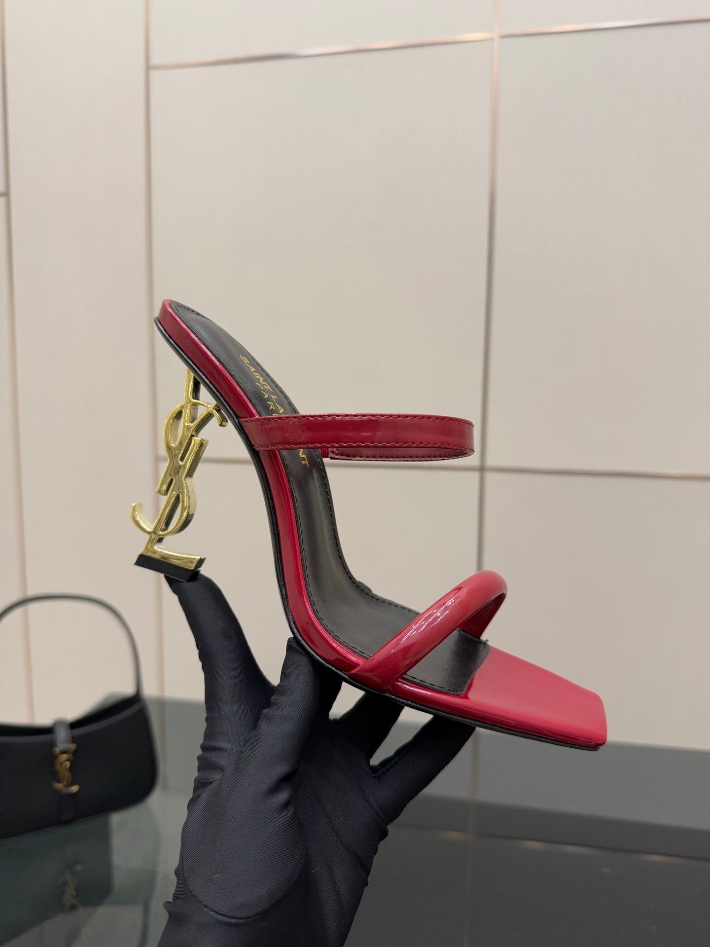 GLOSSY RED STRAPPY HEELS WITH GOLD LOGO HEEL