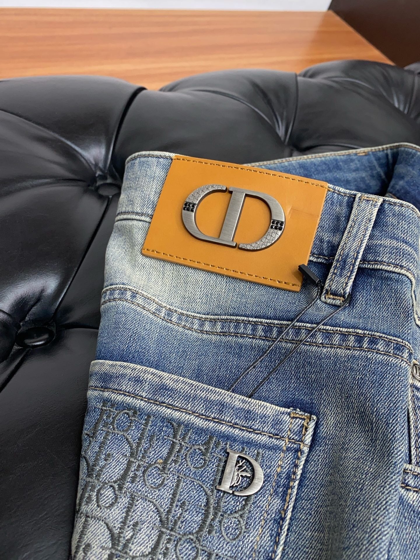 WASHED DENIM LOGO JEANS