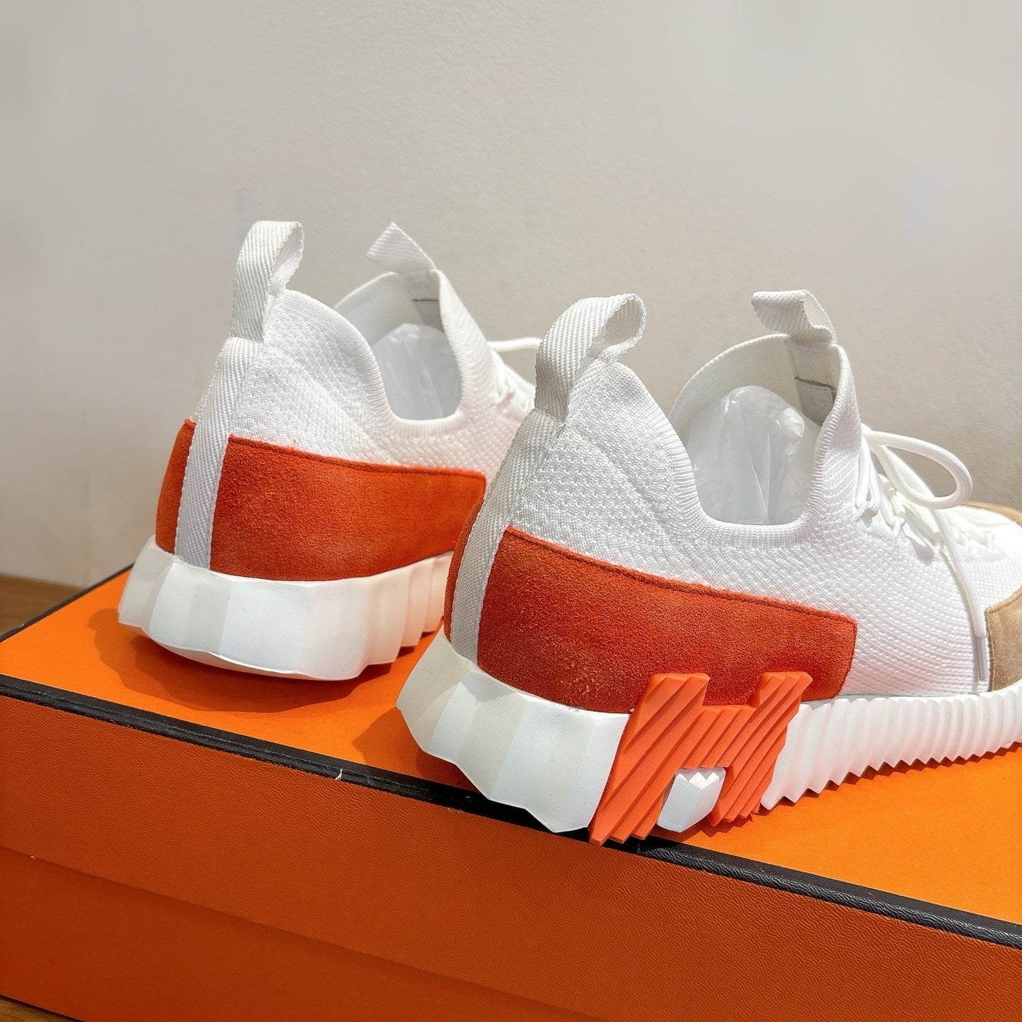 WHITE TECH-KNIT SNEAKERS WITH SUEDE TOE & ORANGE HEEL ACCENT