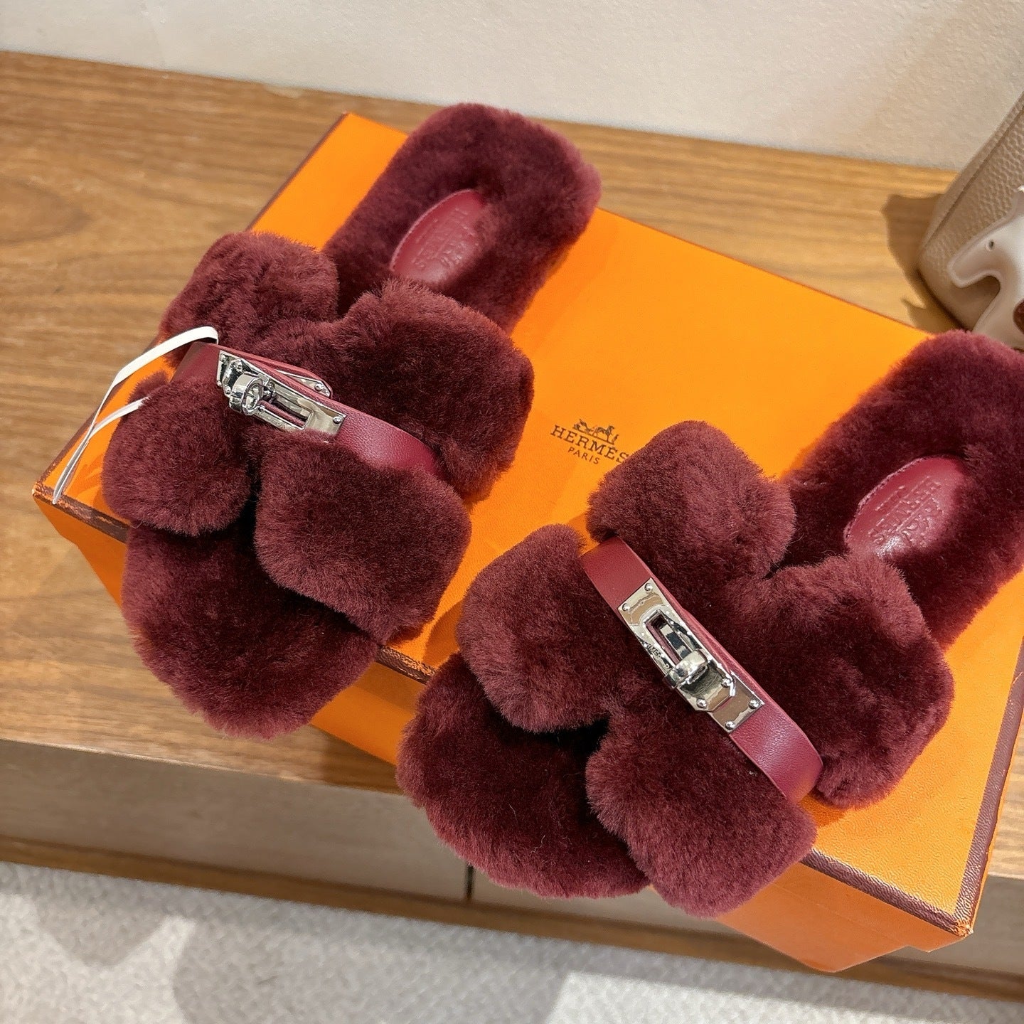 BURGUNDY FAUX FUR MULE SLIPPERS WITH METALLIC ACCENT