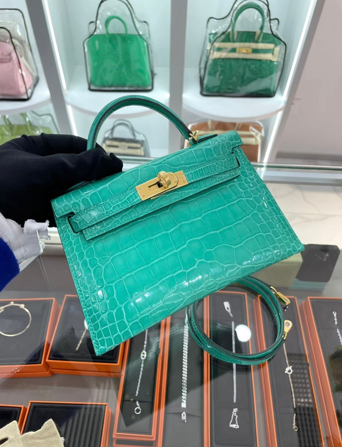EMERALD GREEN CROCODILE EMBOSSED MINI TOP HANDLE EVENING BAG WITH GOLD HARDWARE