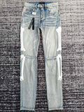 SKELETON APPLIQUÉ DISTRESSED SKINNY JEANS