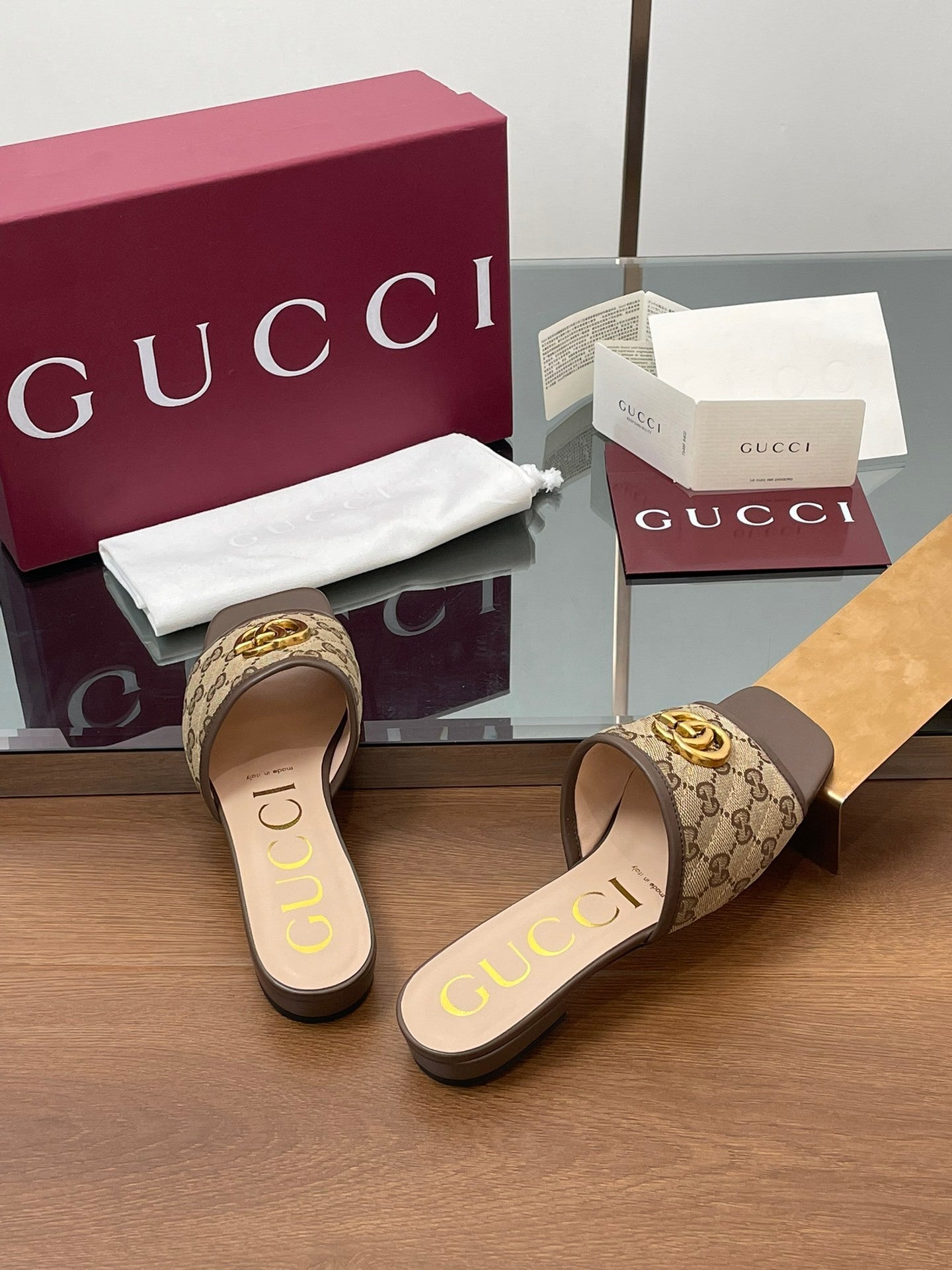 BROWN MONOGRAM FLAT SLIDES