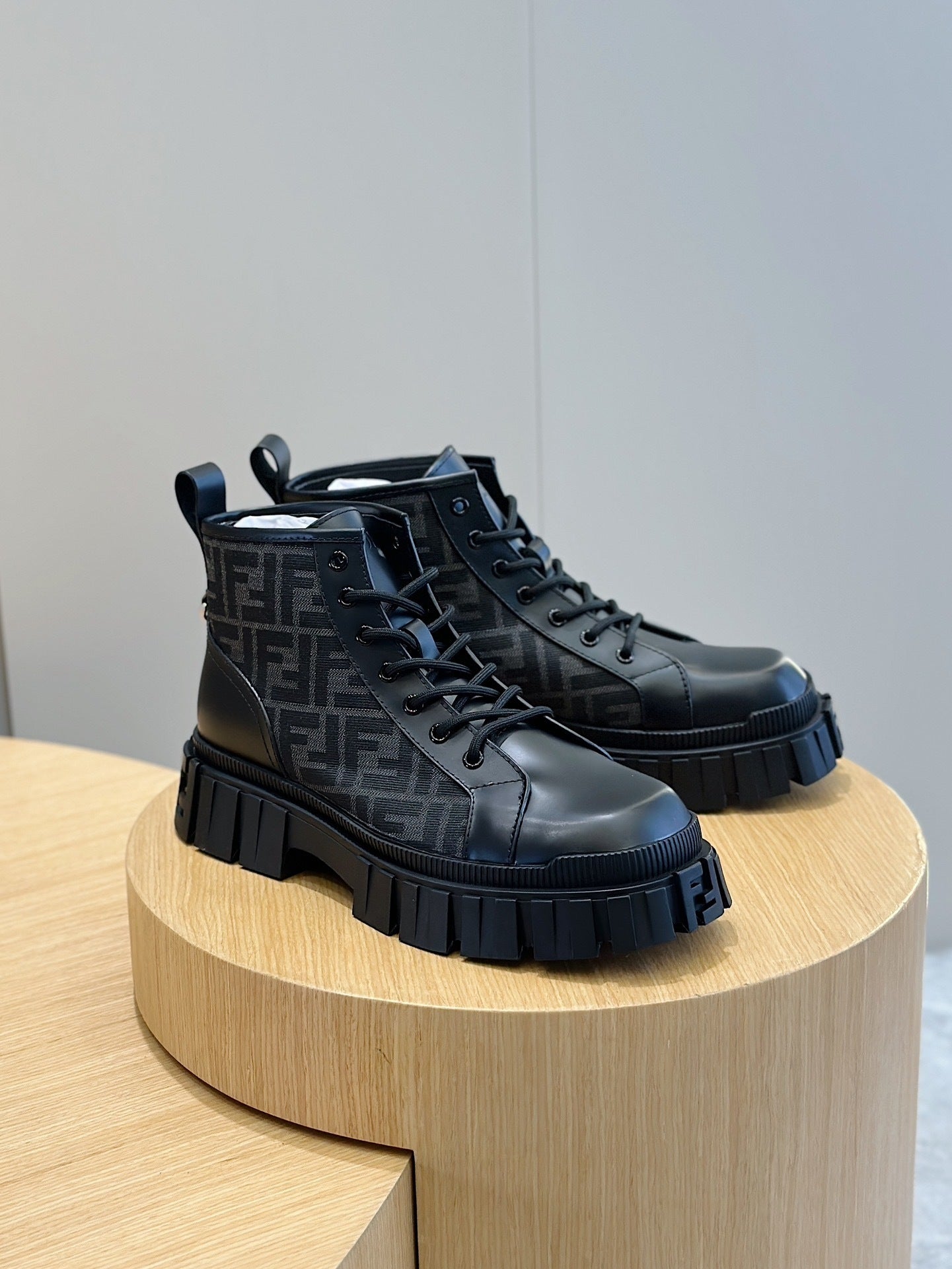 BLACK LACE-UP ANKLE BOOTS WITH MONOGRAM DETAIL AND CHUNKY SOLE