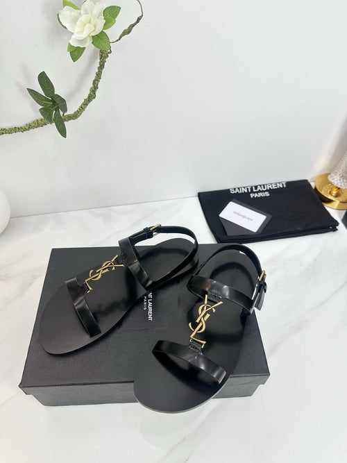BLACK MINIMAL STRAP SANDALS WITH GOLD LOGO ACCENT