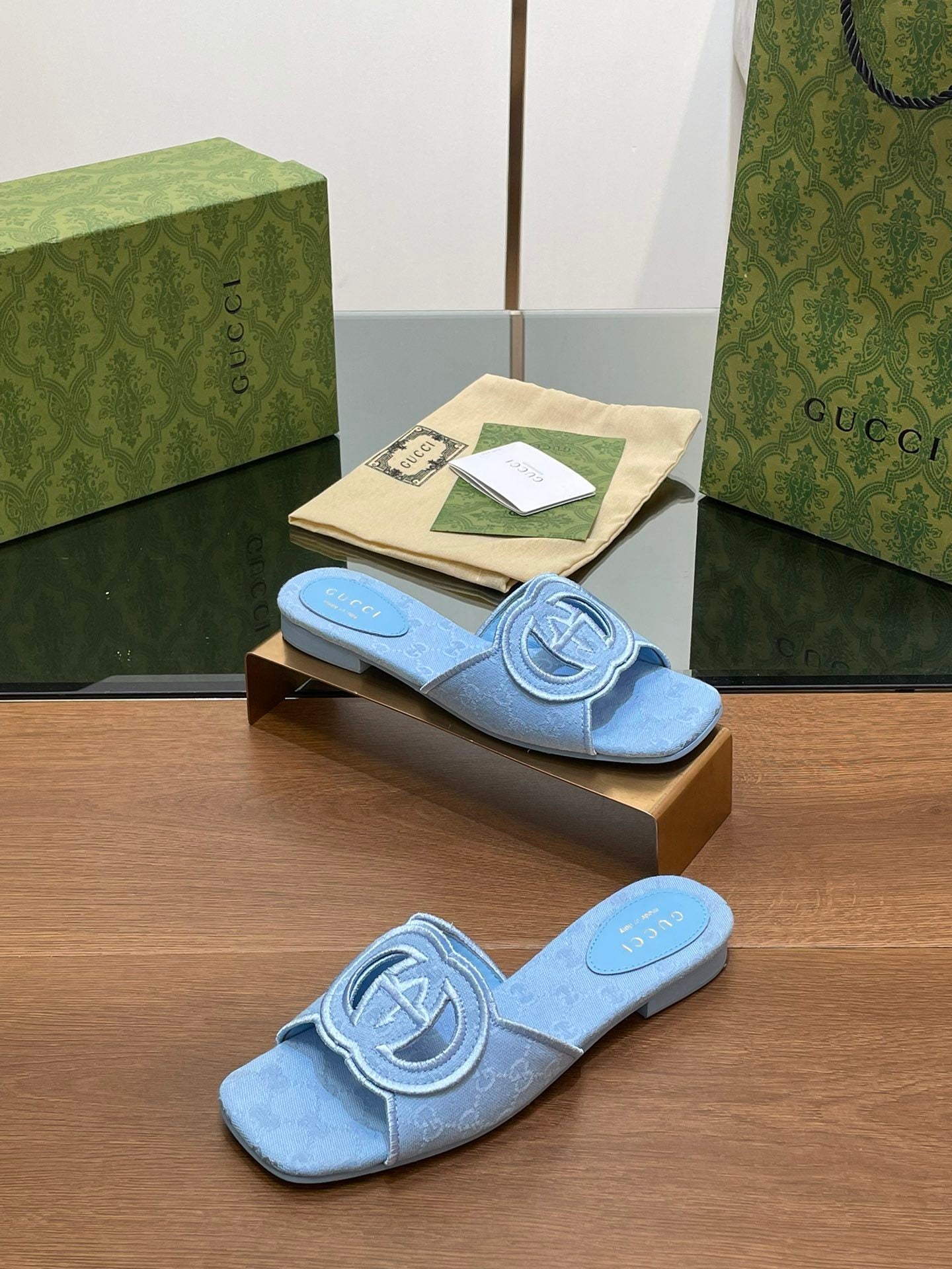 BLUE EMBOSSED LOGO SLIDES
