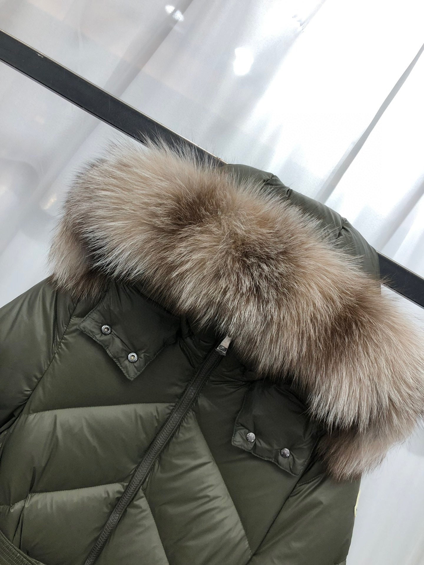 WOMEN’S BELTED LONG QUILTED WINTER COAT WITH FAUX FUR HOOD