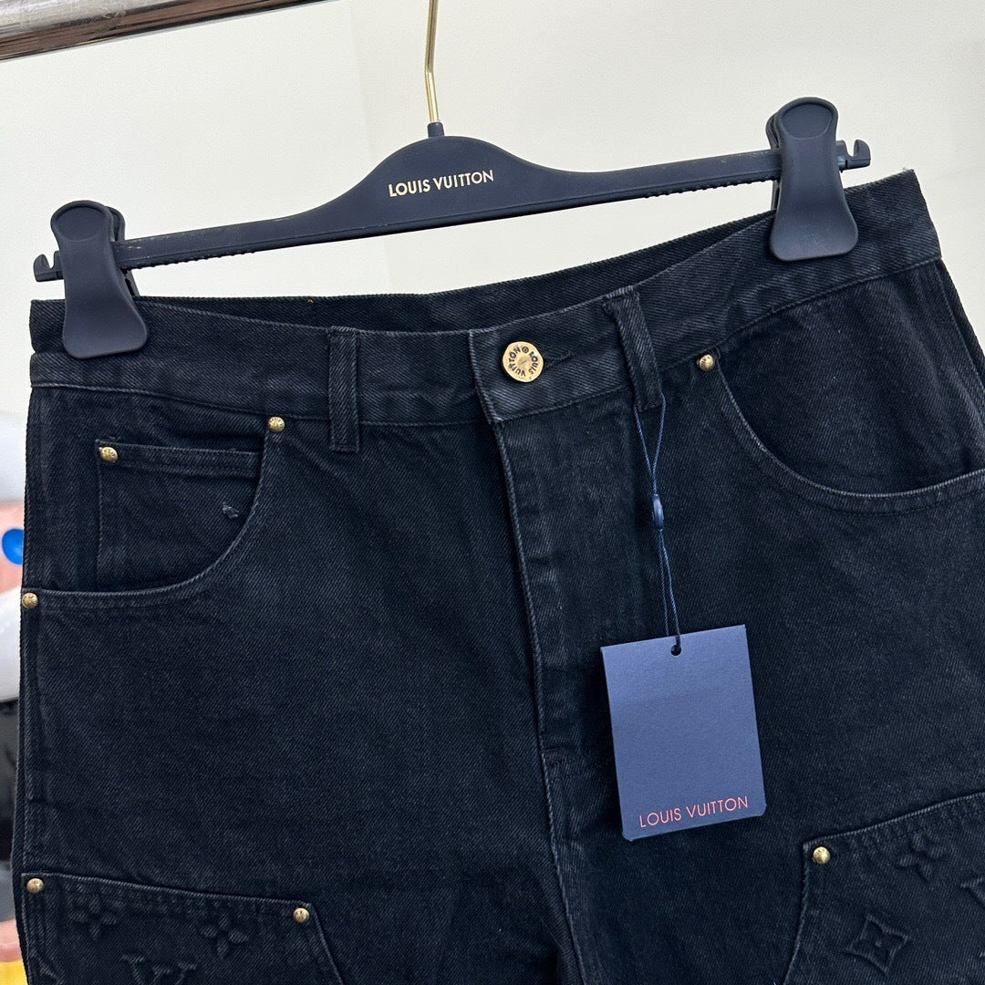 MONOGRAM EMBOSSED DENIM SHORTS