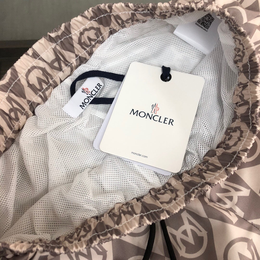 MONOGRAM PRINT SWIM SHORTS