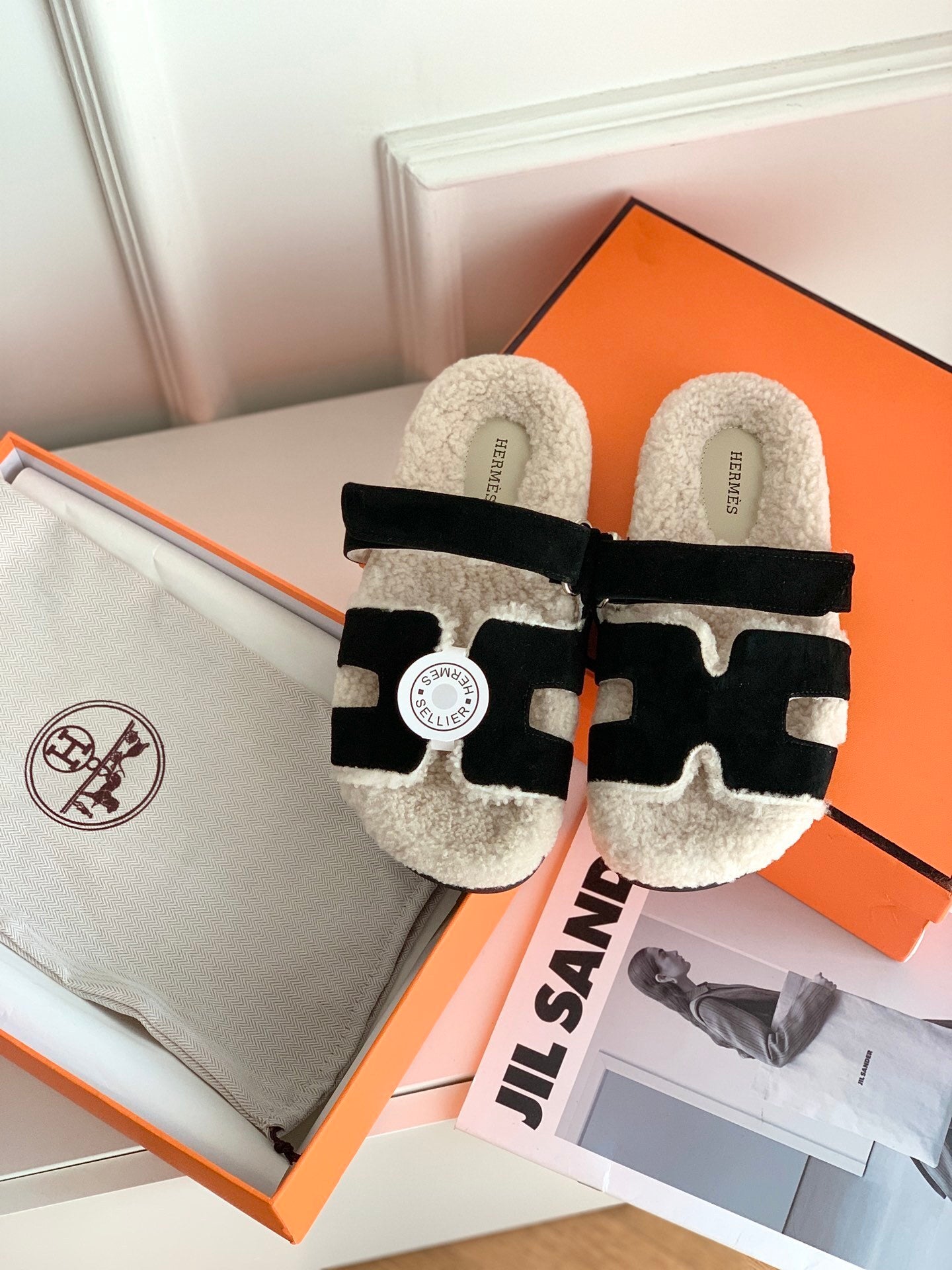 SHEARLING SLIDE SANDALS WITH BLACK STRAPS