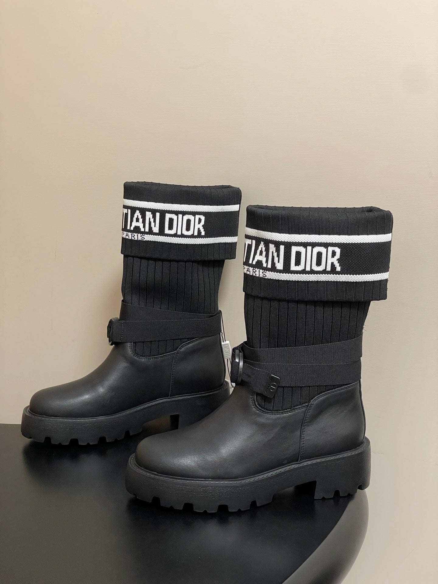 BLACK LEATHER MID-CALF BOOTS WITH RIBBED KNIT CUFF AND LUG SOLE